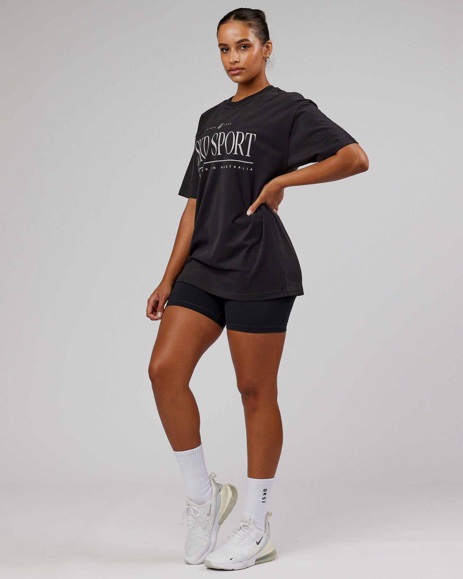 Model wearing Unisex Heritage Heavyweight Tee Oversize - Black-Beige