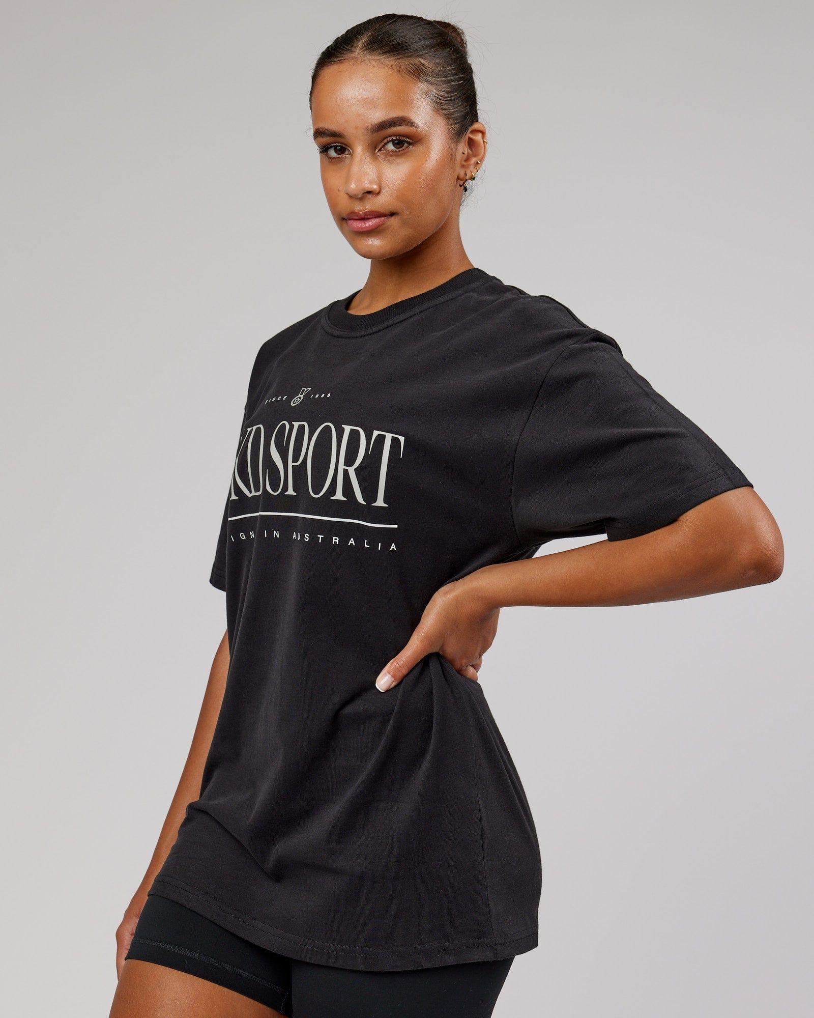 Model wearing Unisex Heritage Heavyweight Tee Oversize - Black-Beige