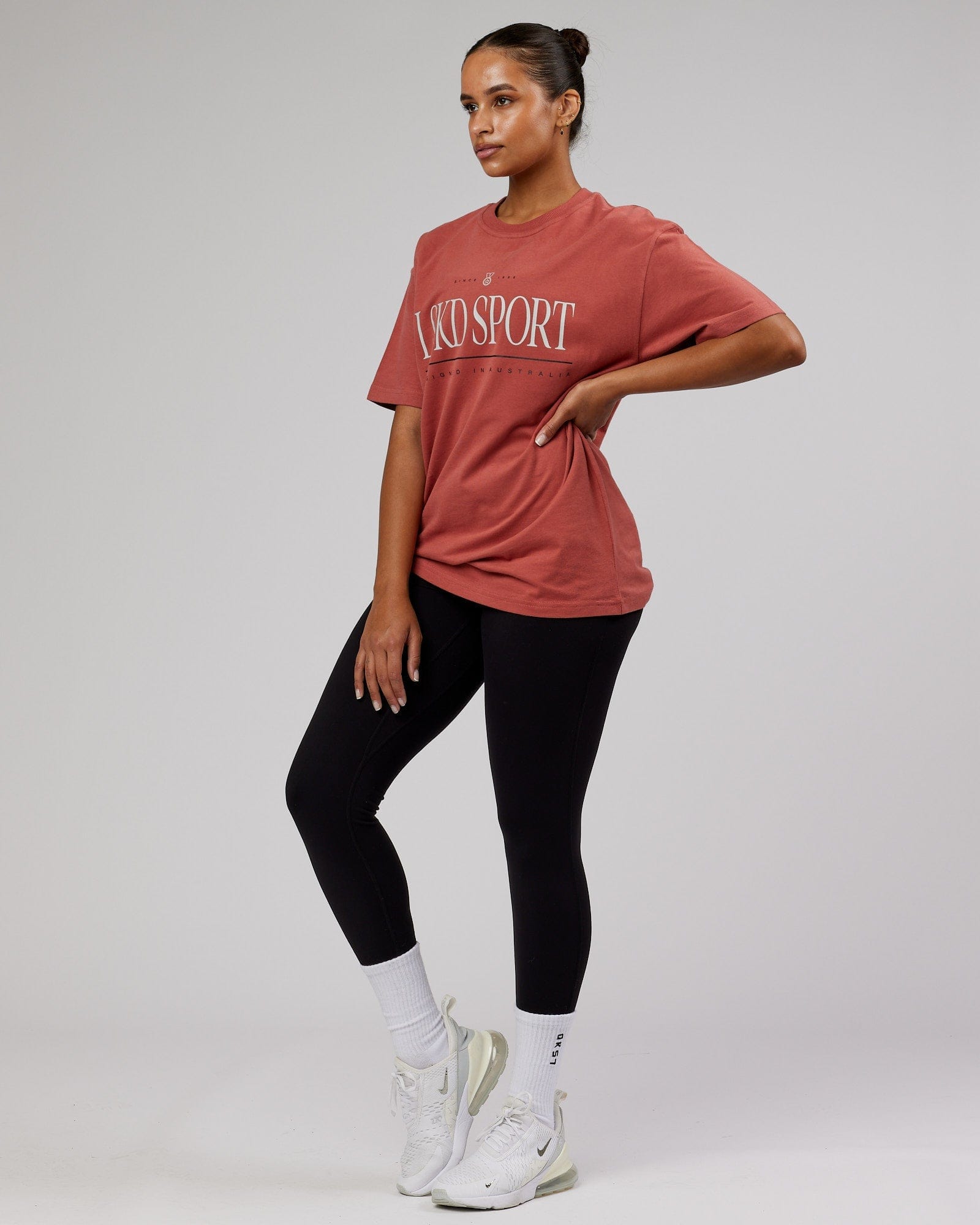 Model wearing Unisex Heritage Heavyweight Tee Oversize - Marsala