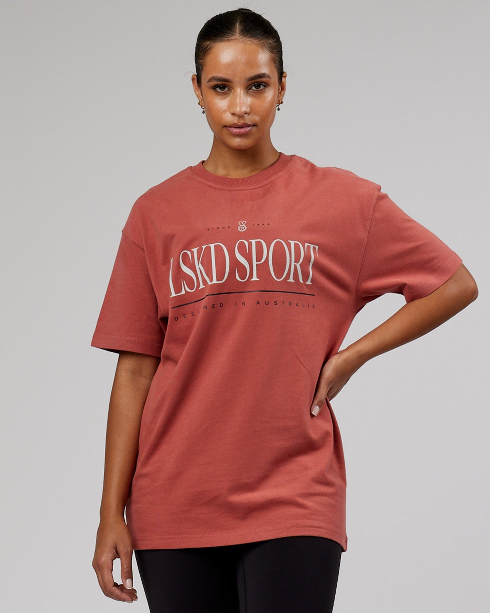 Model wearing Unisex Heritage Heavyweight Tee Oversize - Marsala