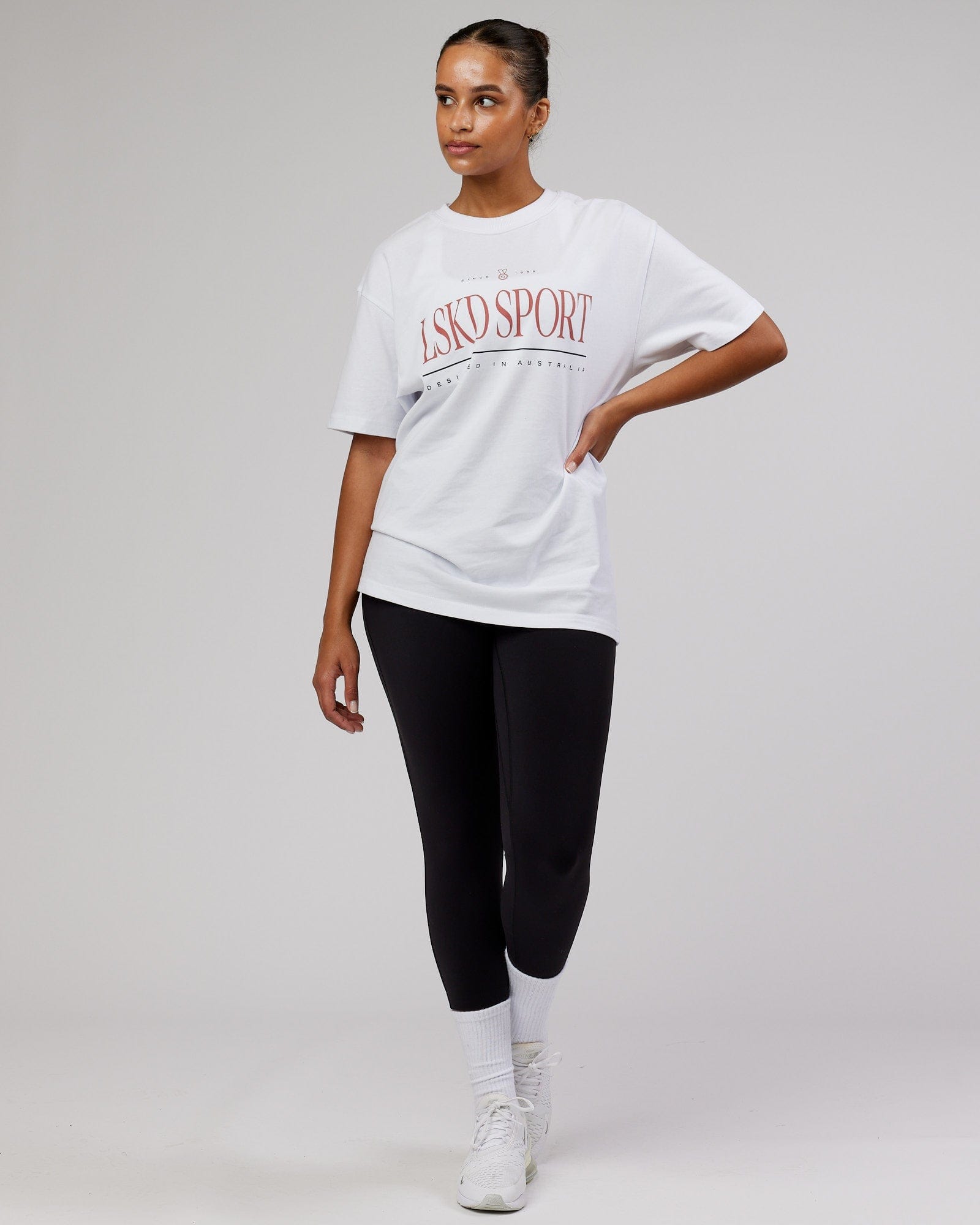 Model wearing Unisex Heritage Heavyweight Tee Oversize - White-Marsala