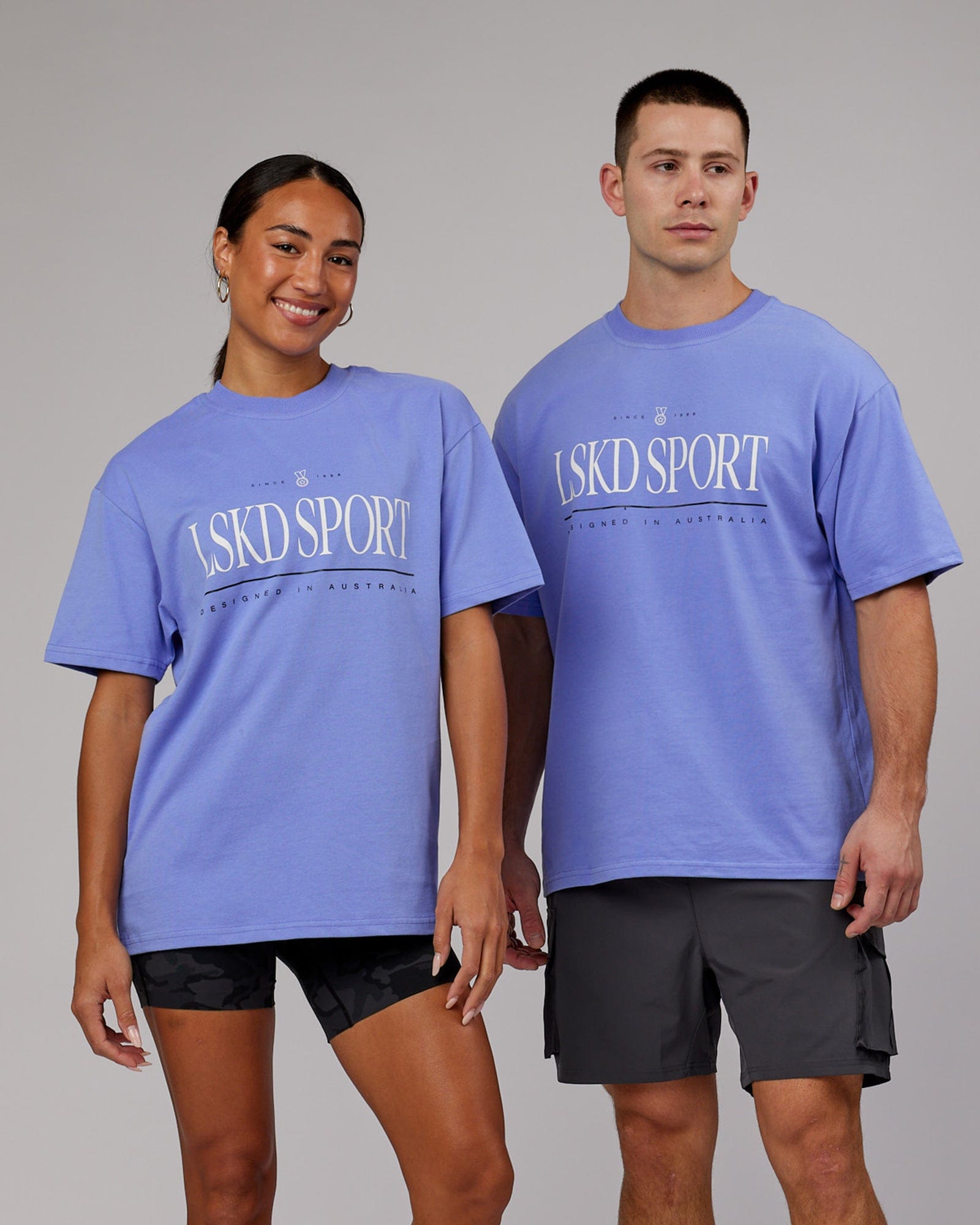 Model wearing Unisex Heritage Heavyweight Tee Oversize - Cornflower Blue