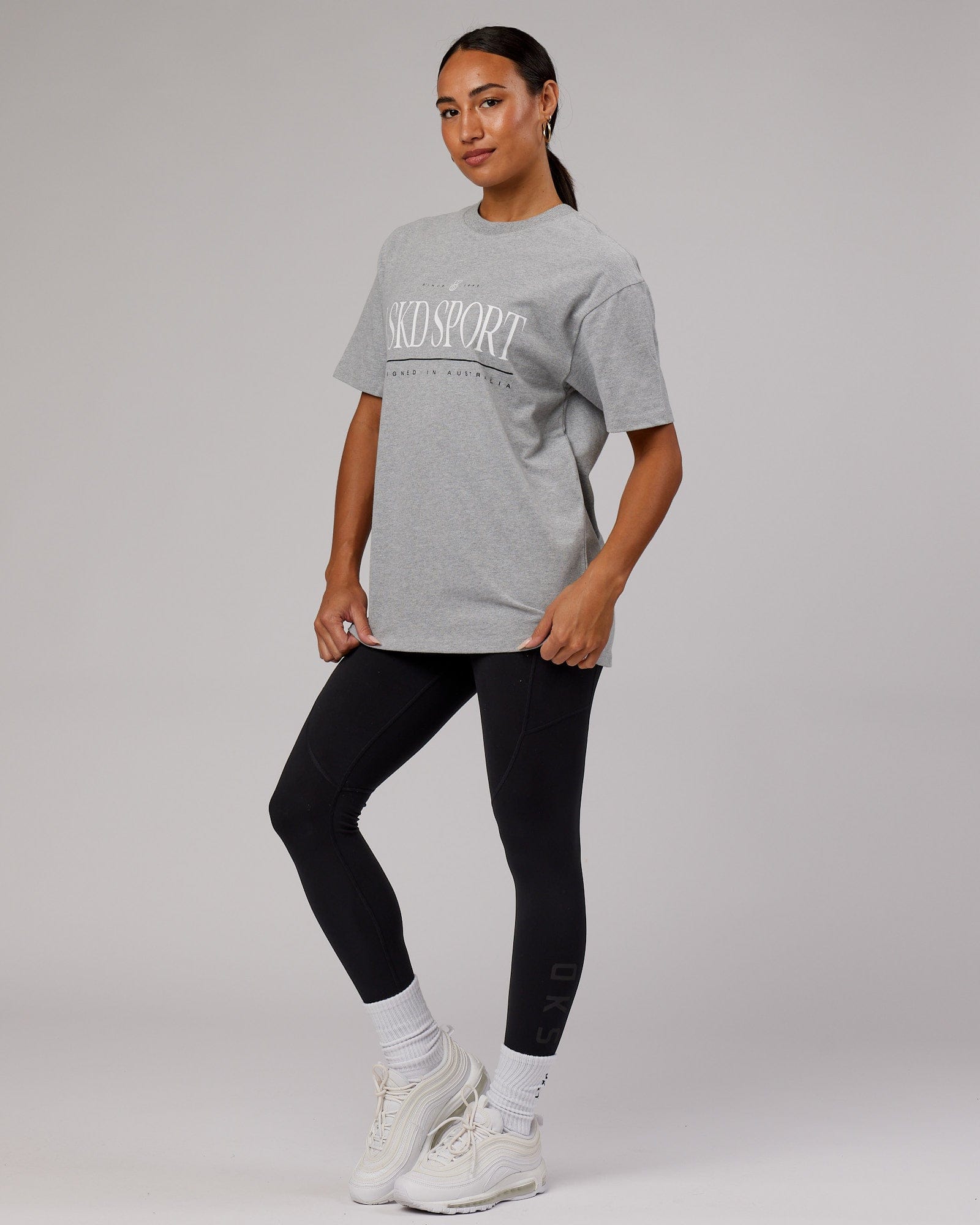 Model wearing Unisex Heritage Heavyweight Tee Oversize - Lt Grey Marl