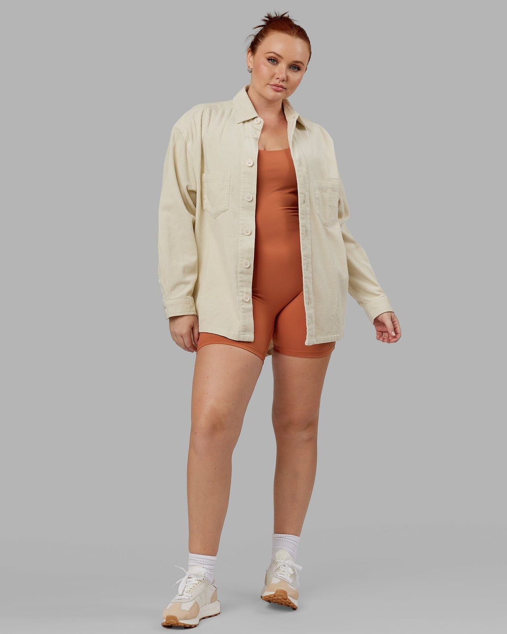 Model wearing Unisex Iconic Cord Shacket - Bone