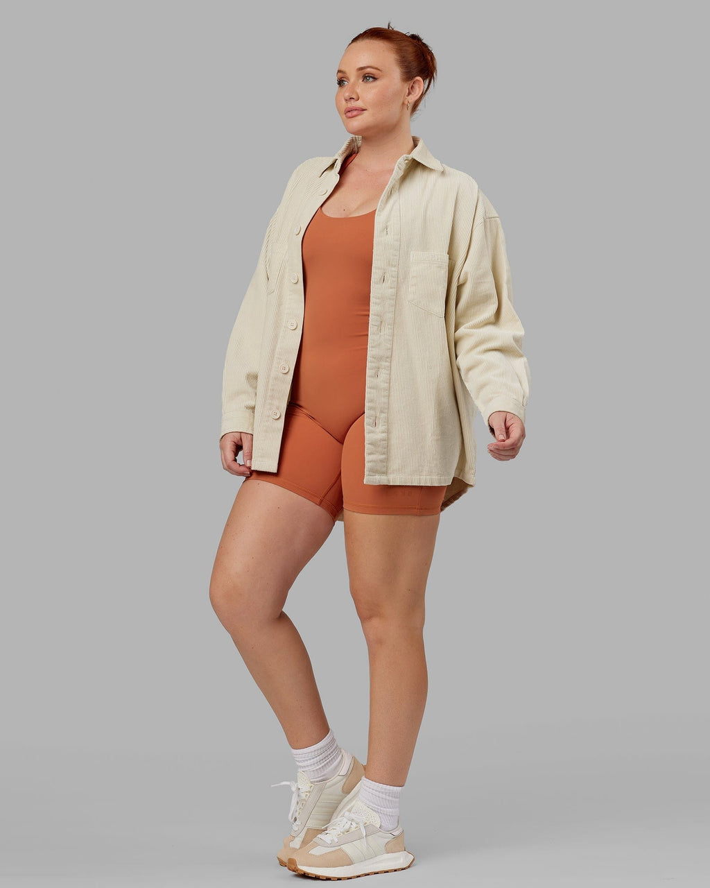 Model wearing Unisex Iconic Cord Shacket - Bone