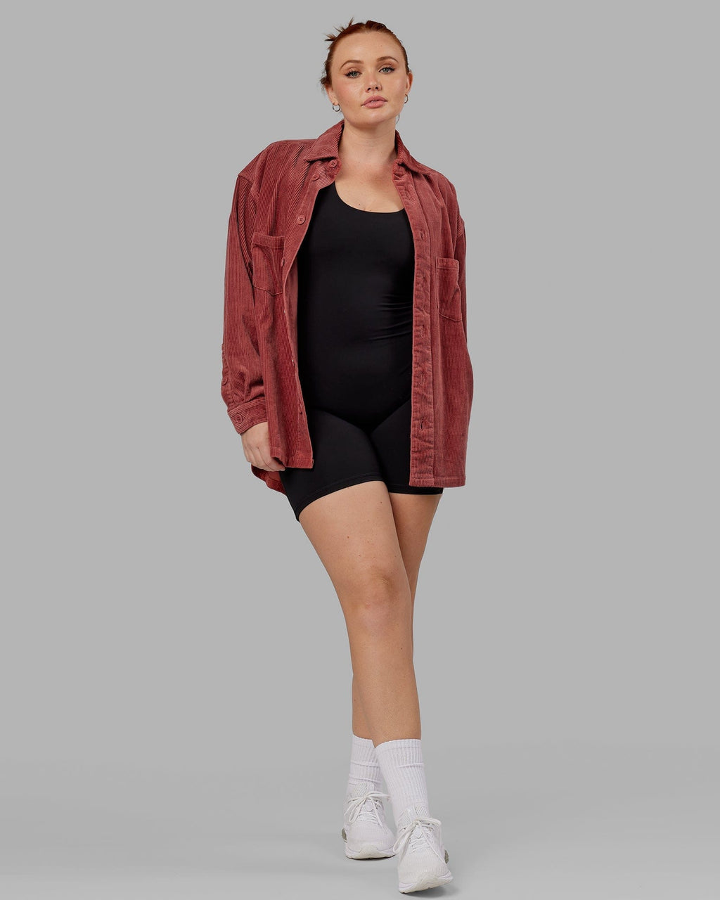 Model wearing Unisex Iconic Cord Shacket - Marsala