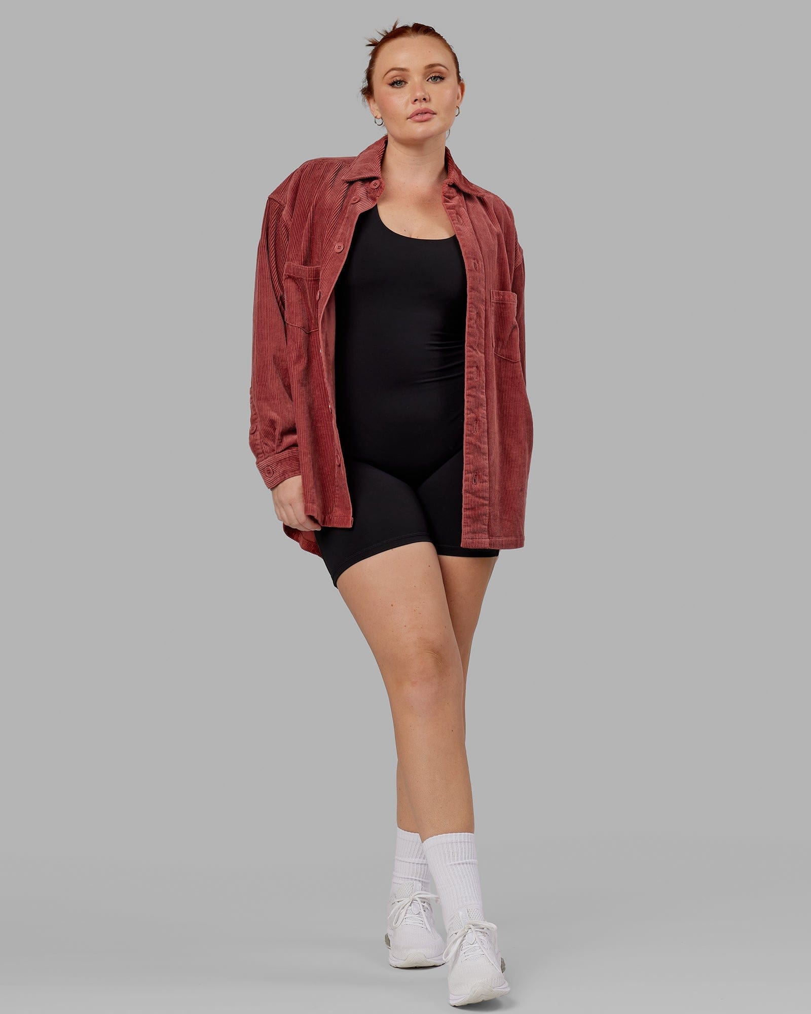 Model wearing Unisex Iconic Cord Shacket - Marsala