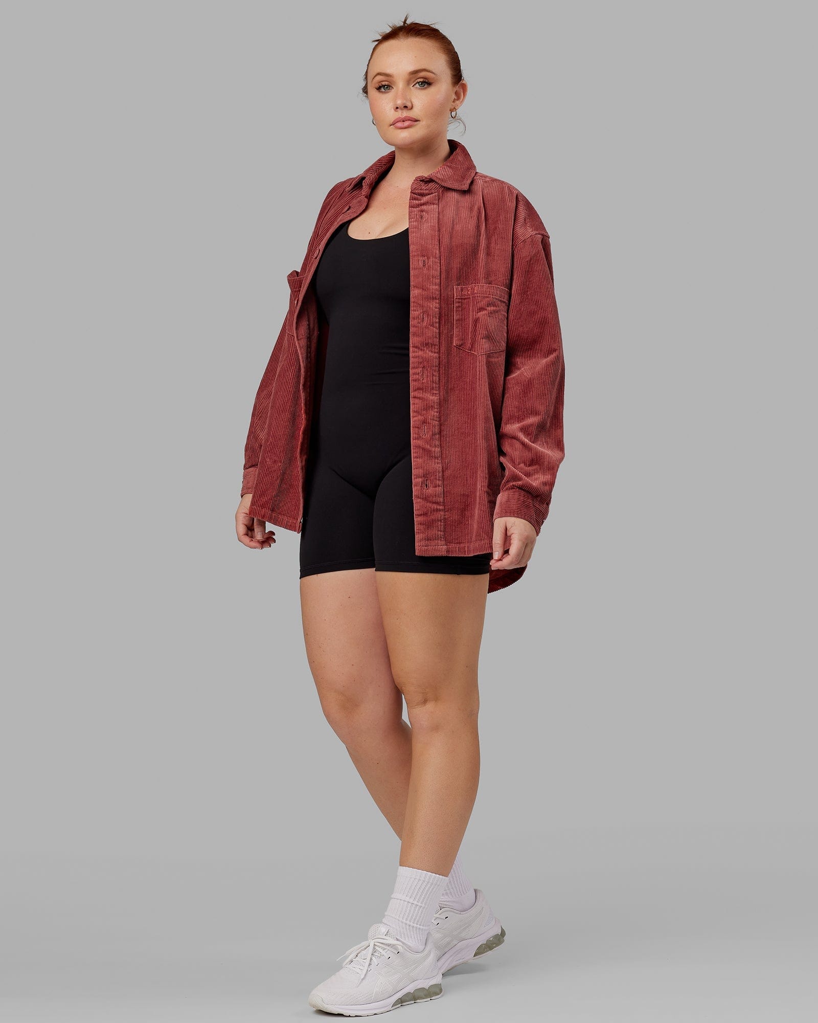 Model wearing Unisex Iconic Cord Shacket - Marsala