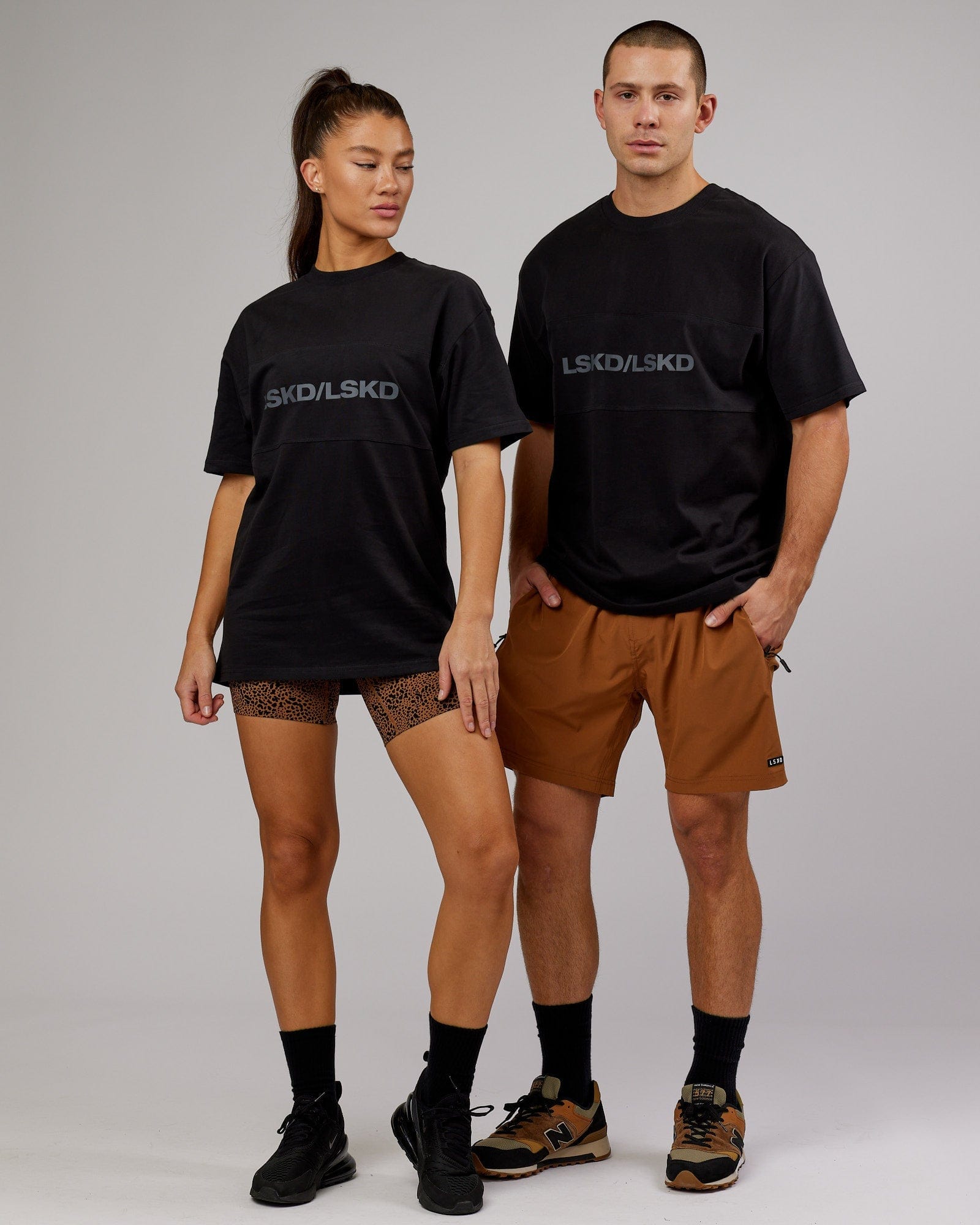 Model wearing Unisex Impact Heavyweight Tee Oversize - Black-Grey