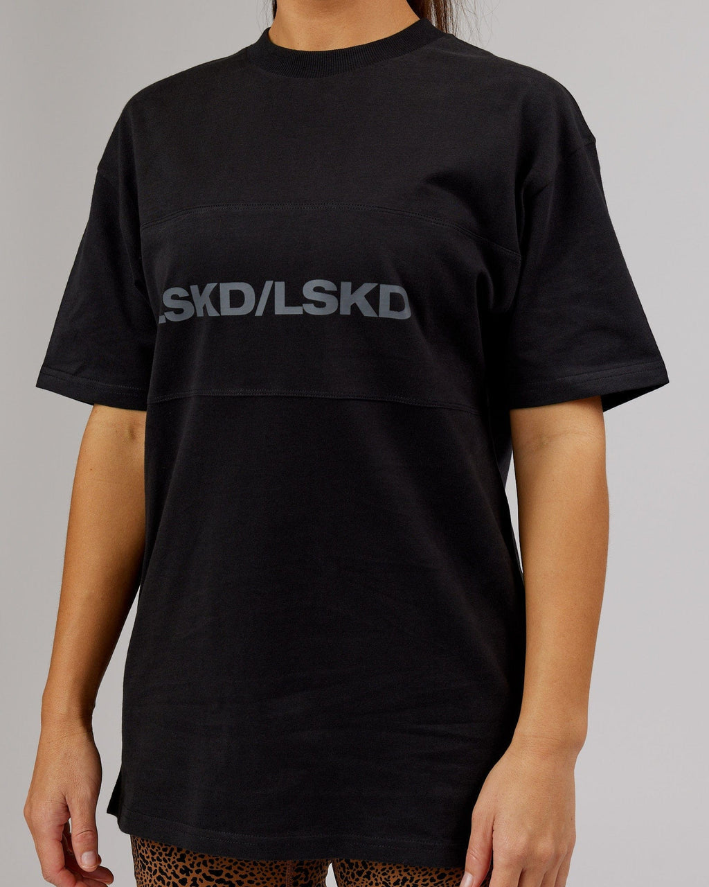 Model wearing Unisex Impact Heavyweight Tee Oversize - Black-Grey