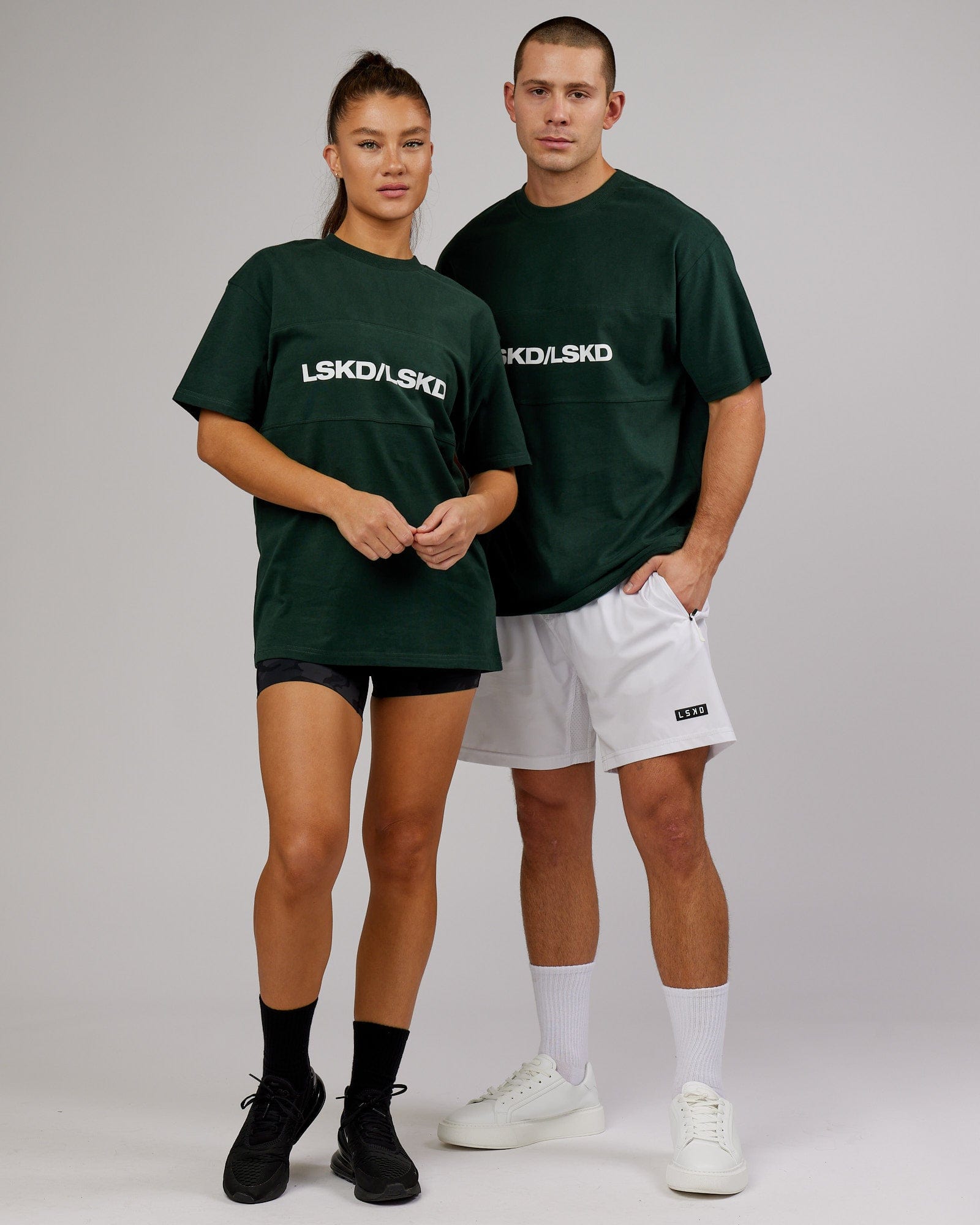 Model wearing Unisex Impact Heavyweight Tee Oversize - Forest