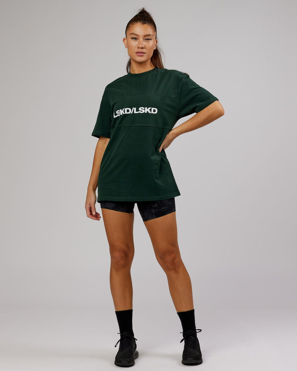 Model wearing Unisex Impact Heavyweight Tee Oversize - Forest