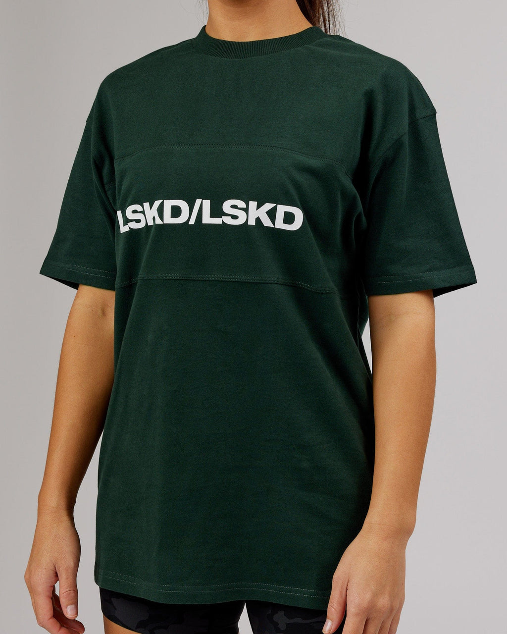 Model wearing Unisex Impact Heavyweight Tee Oversize - Forest