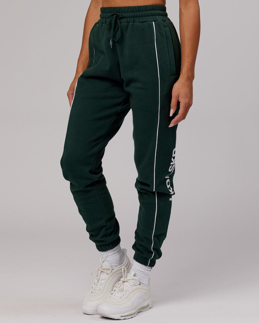 Model wearing Unisex Impact Trackpants - Forest