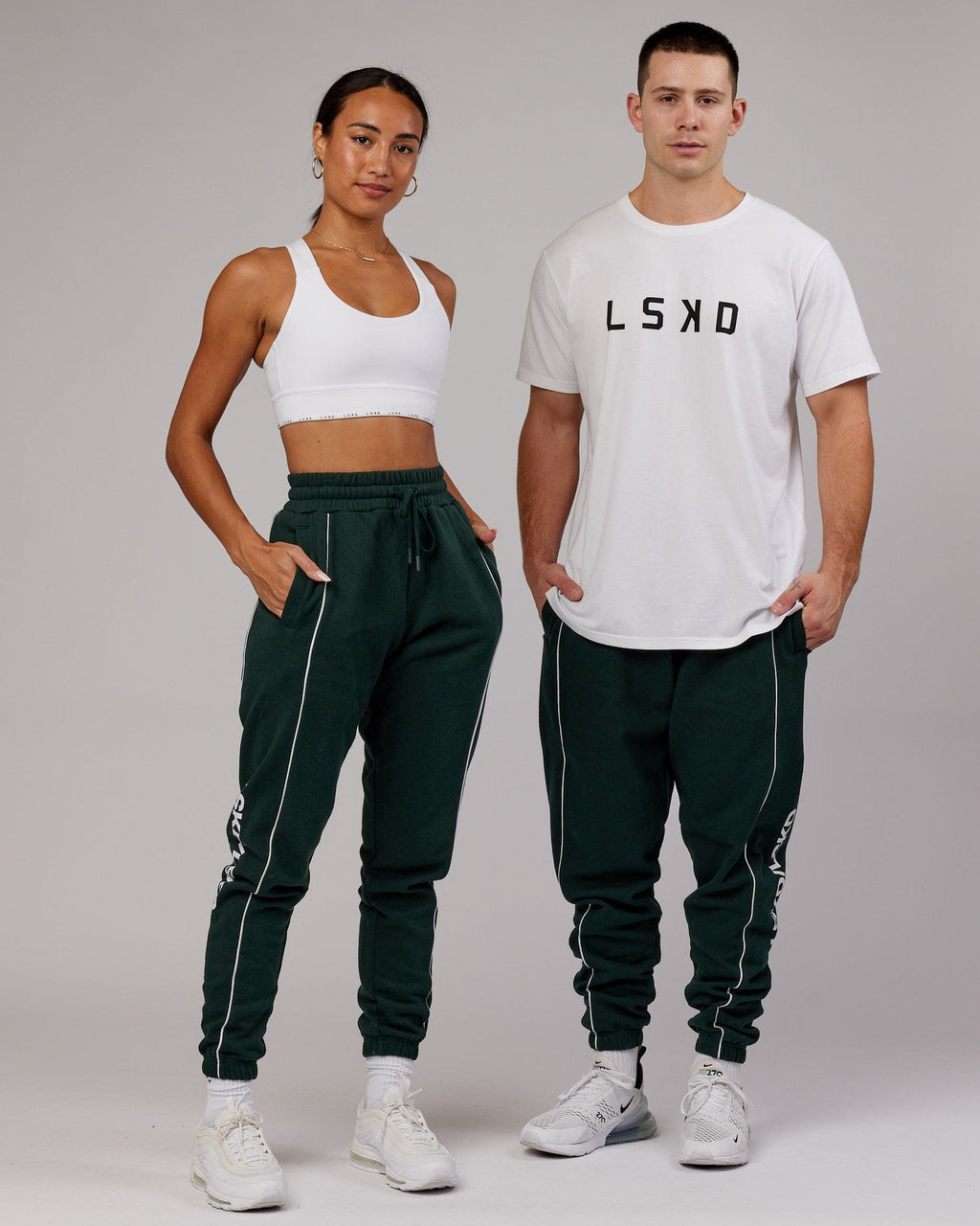 Model wearing Unisex Impact Trackpants - Forest