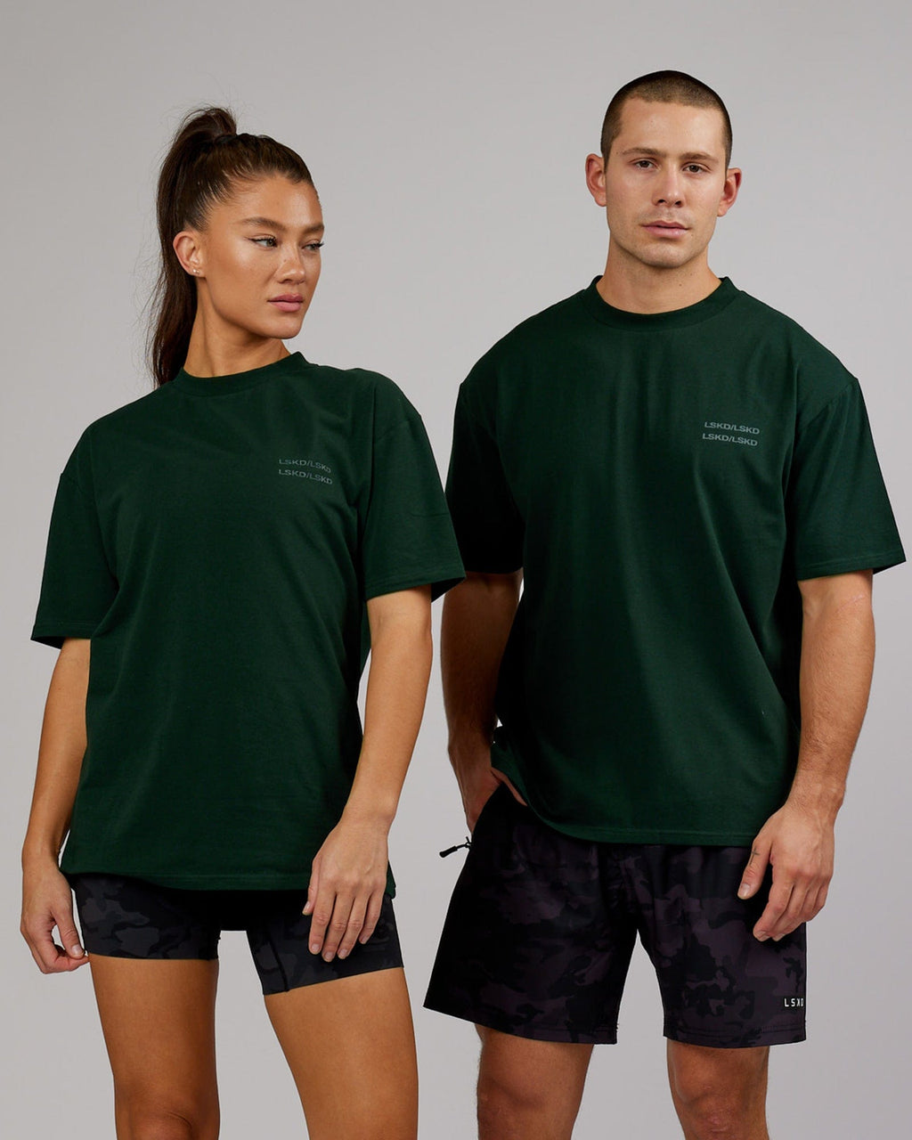Model wearing Unisex Quad FLXCotton Tee Oversize - Forest