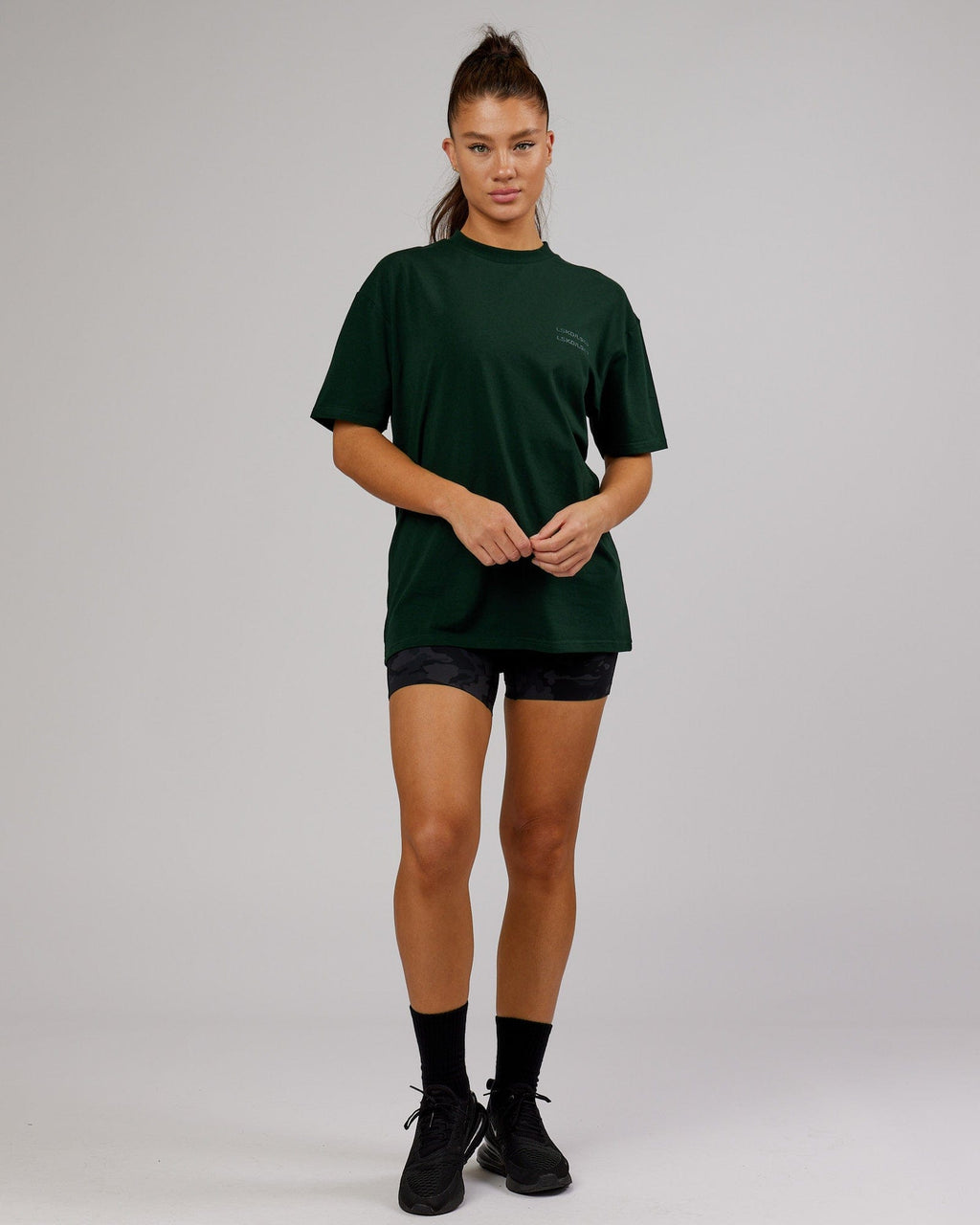 Model wearing Unisex Quad FLXCotton Tee Oversize - Forest