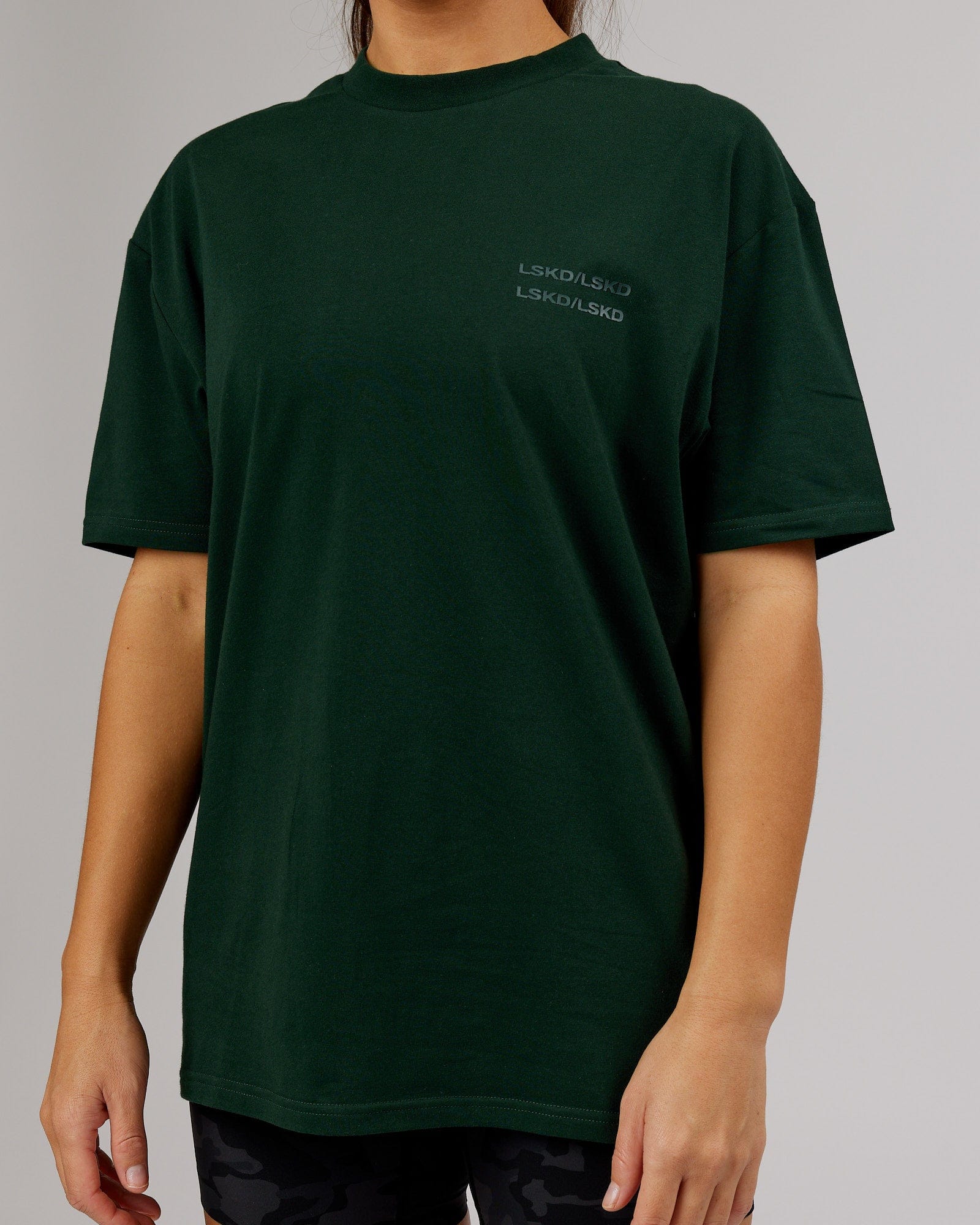 Model wearing Unisex Quad FLXCotton Tee Oversize - Forest