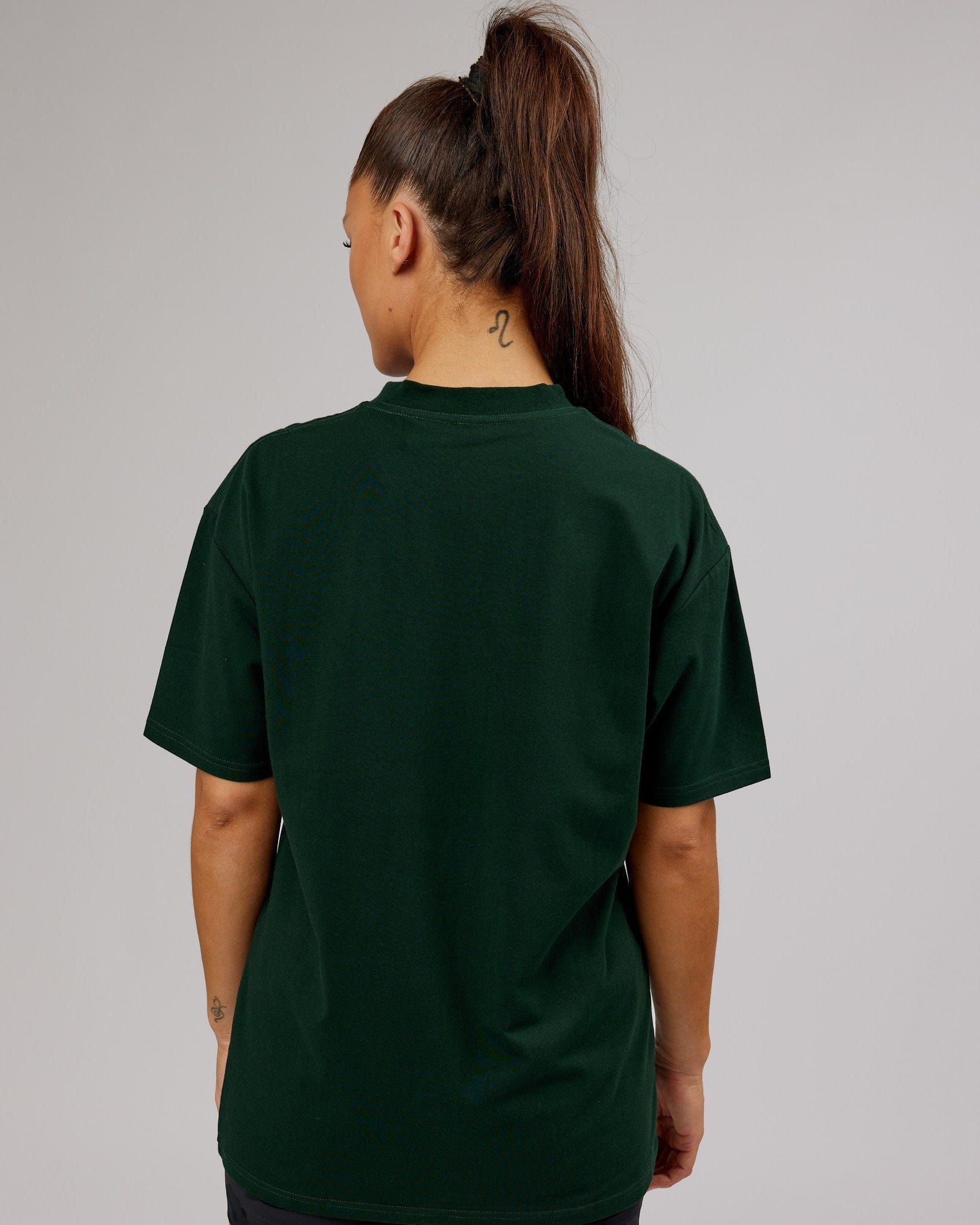 Model wearing Unisex Quad FLXCotton Tee Oversize - Forest