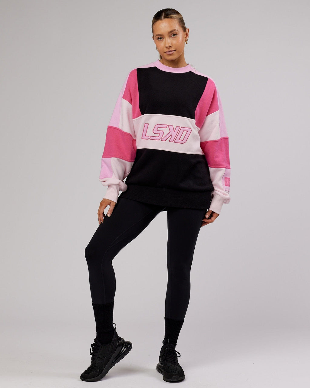 Model wearing Unisex Slam Sweater Oversize - Black-Pink Multi