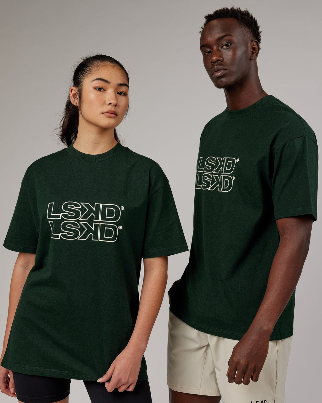 Model wearing Unisex Stacks Up Heavyweight Oversize Tee - Forest