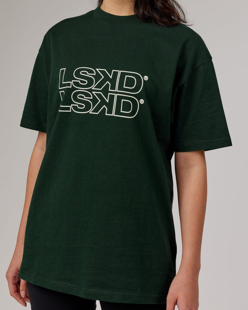 Model wearing Unisex Stacks Up Heavyweight Oversize Tee - Forest