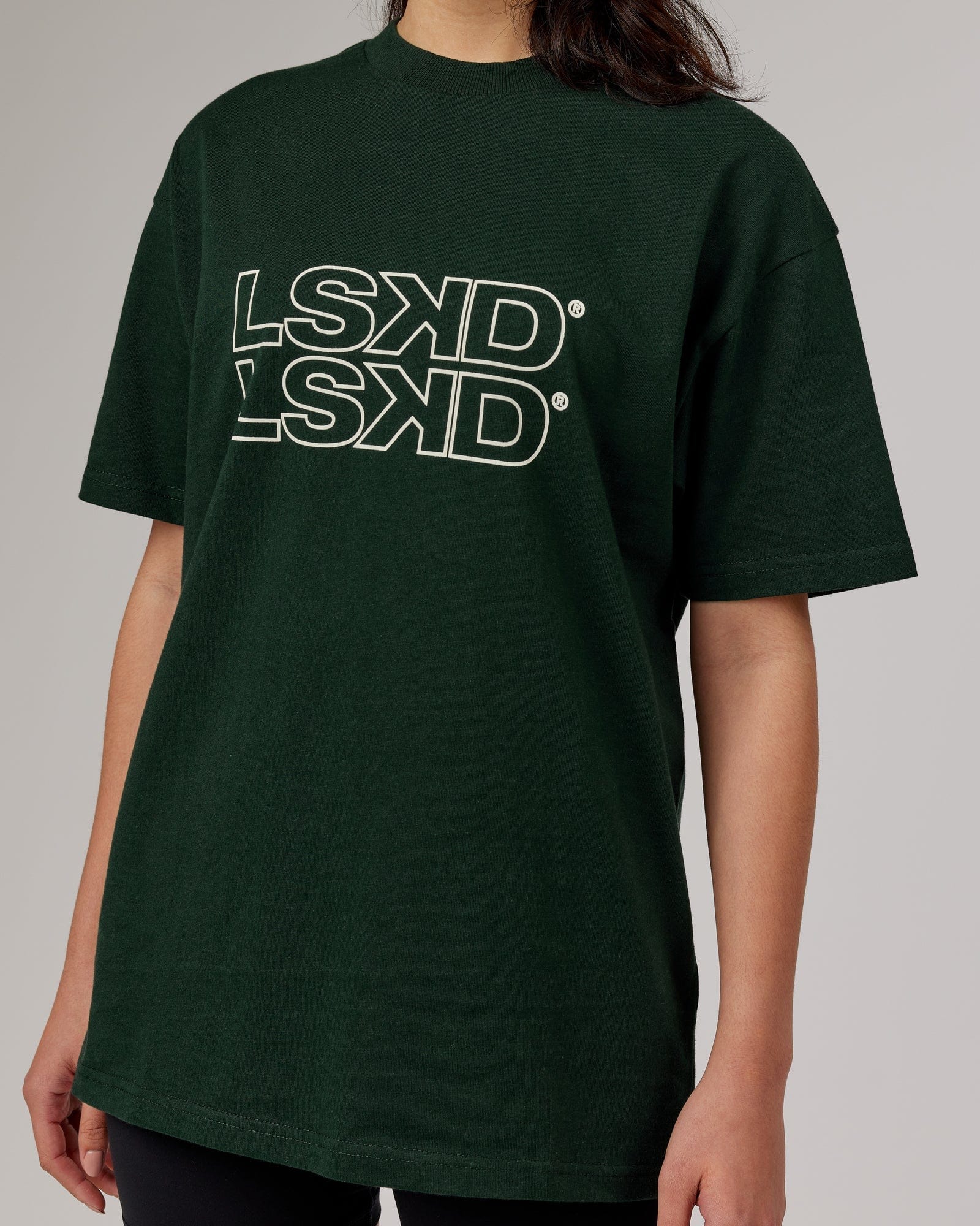 Model wearing Unisex Stacks Up Heavyweight Oversize Tee - Forest