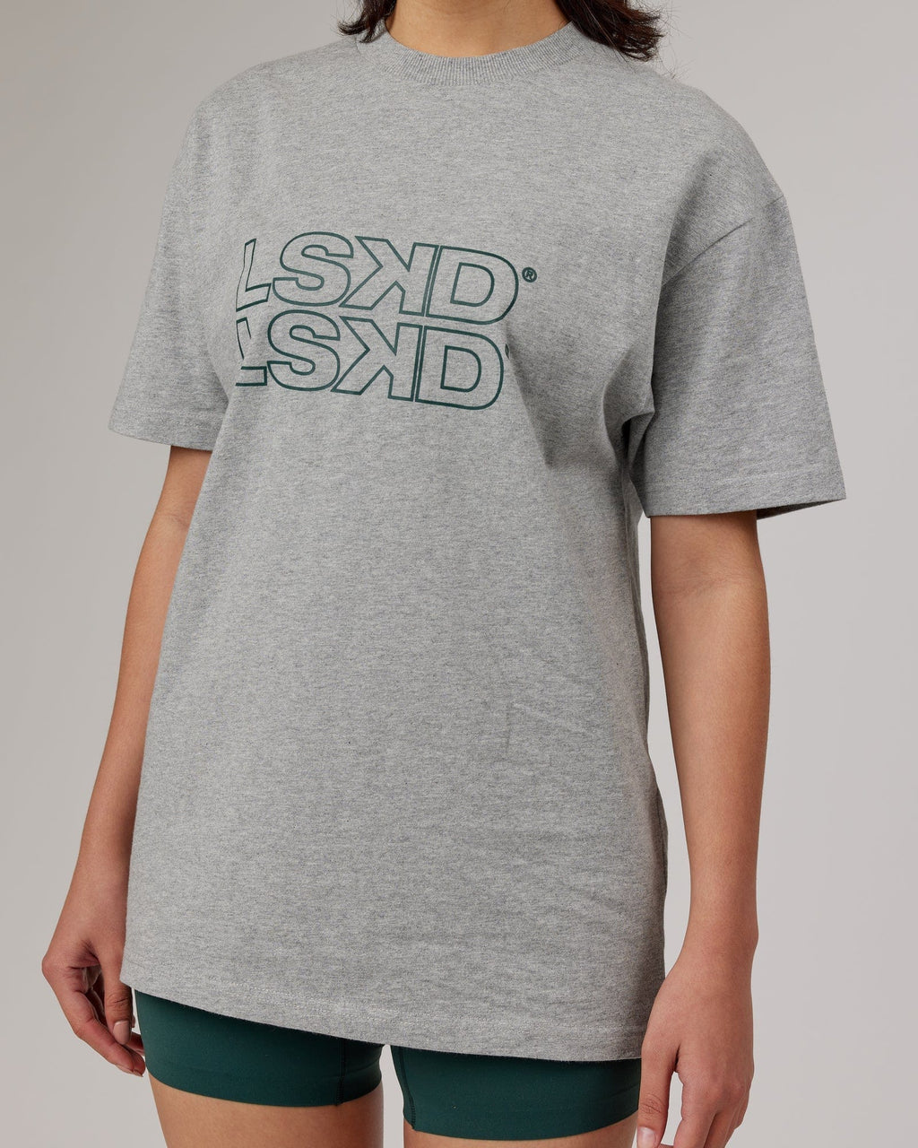 Model wearing Unisex Stacks Up Heavyweight Oversize Tee - Lt Grey Marl