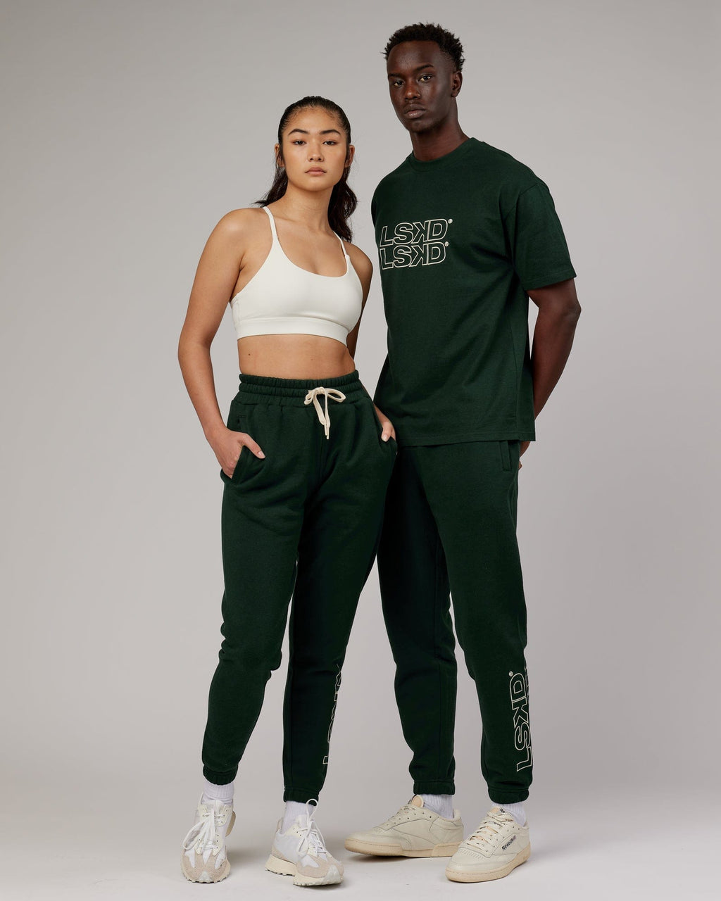 Model wearing Unisex Stacks Up Track Pant - Forest