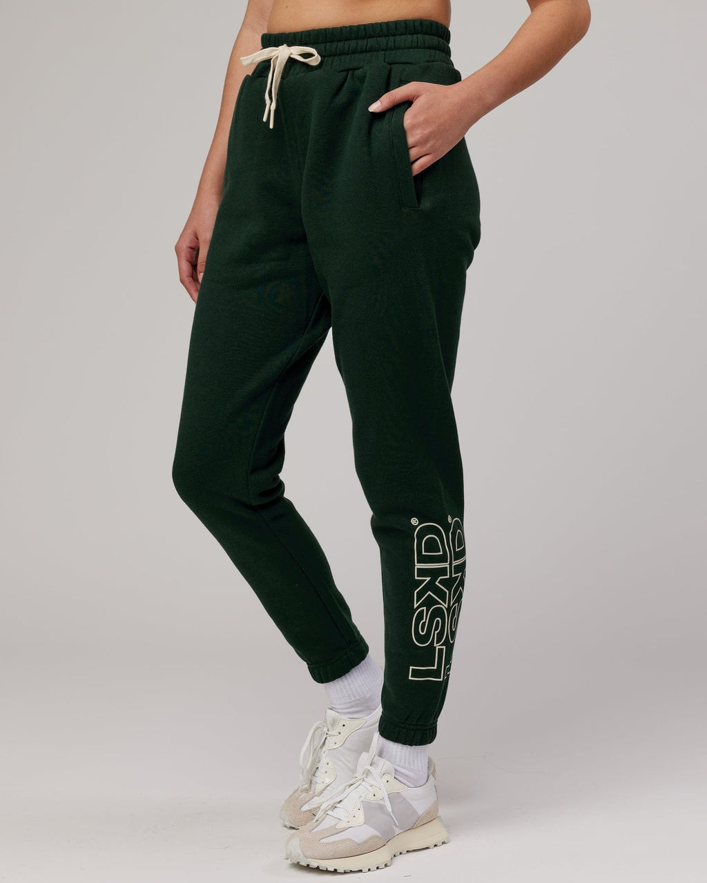 Model wearing Unisex Stacks Up Track Pant - Forest