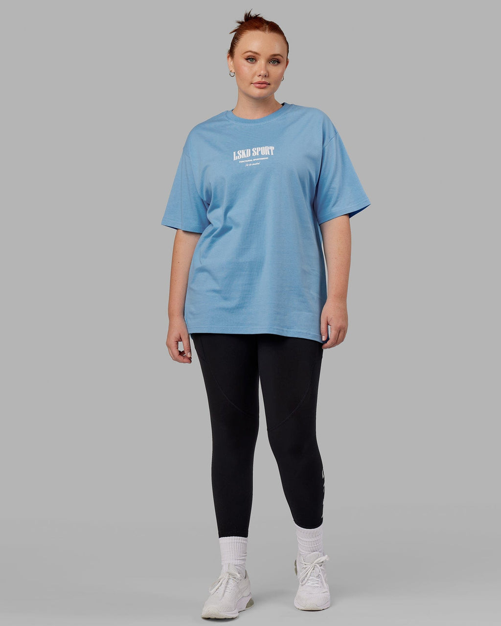 Model wearing Unisex Standard Heavyweight Tee Oversize - Azure Blue
