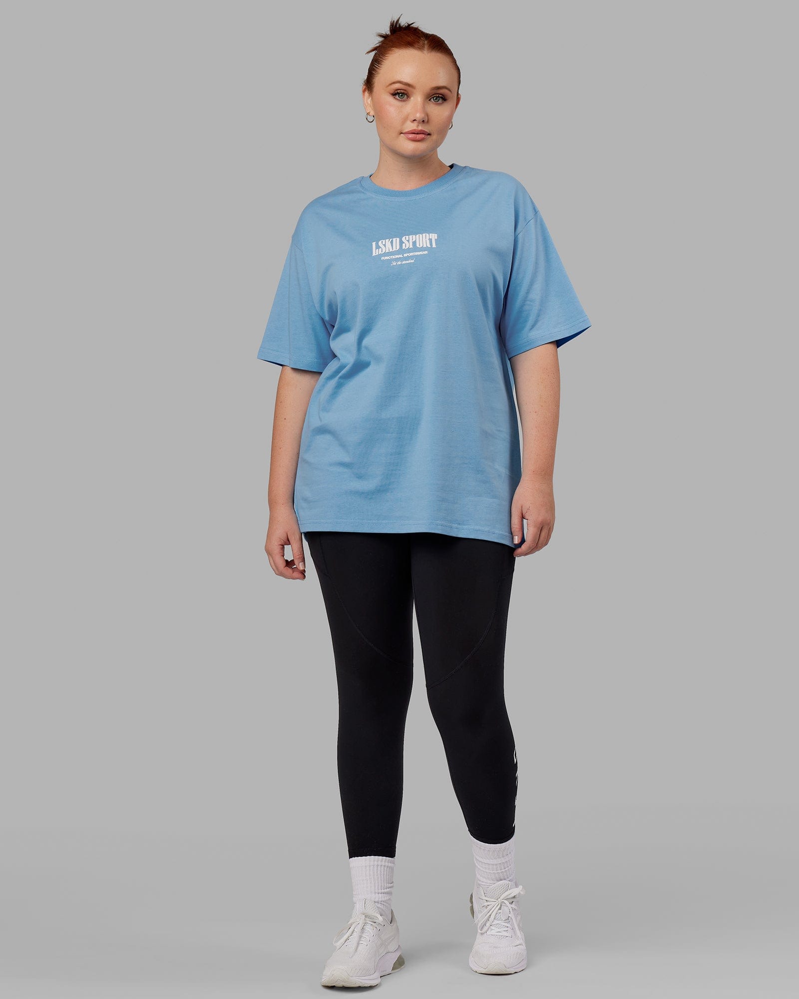 Model wearing Unisex Standard Heavyweight Tee Oversize - Azure Blue