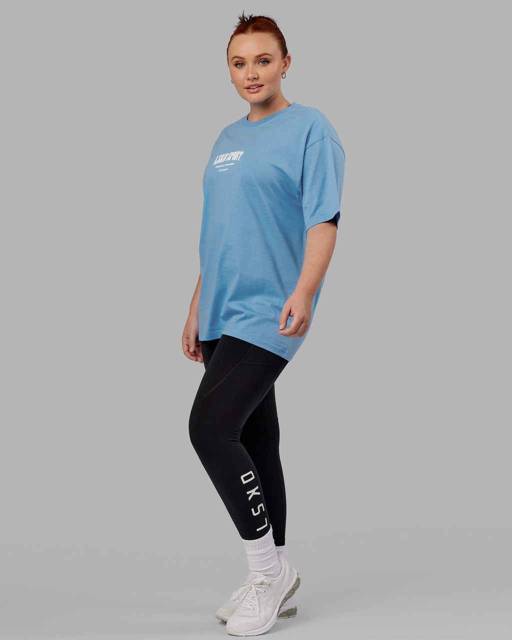 Model wearing Unisex Standard Heavyweight Tee Oversize - Azure Blue