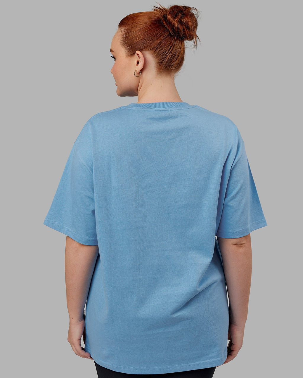 Model wearing Unisex Standard Heavyweight Tee Oversize - Azure Blue