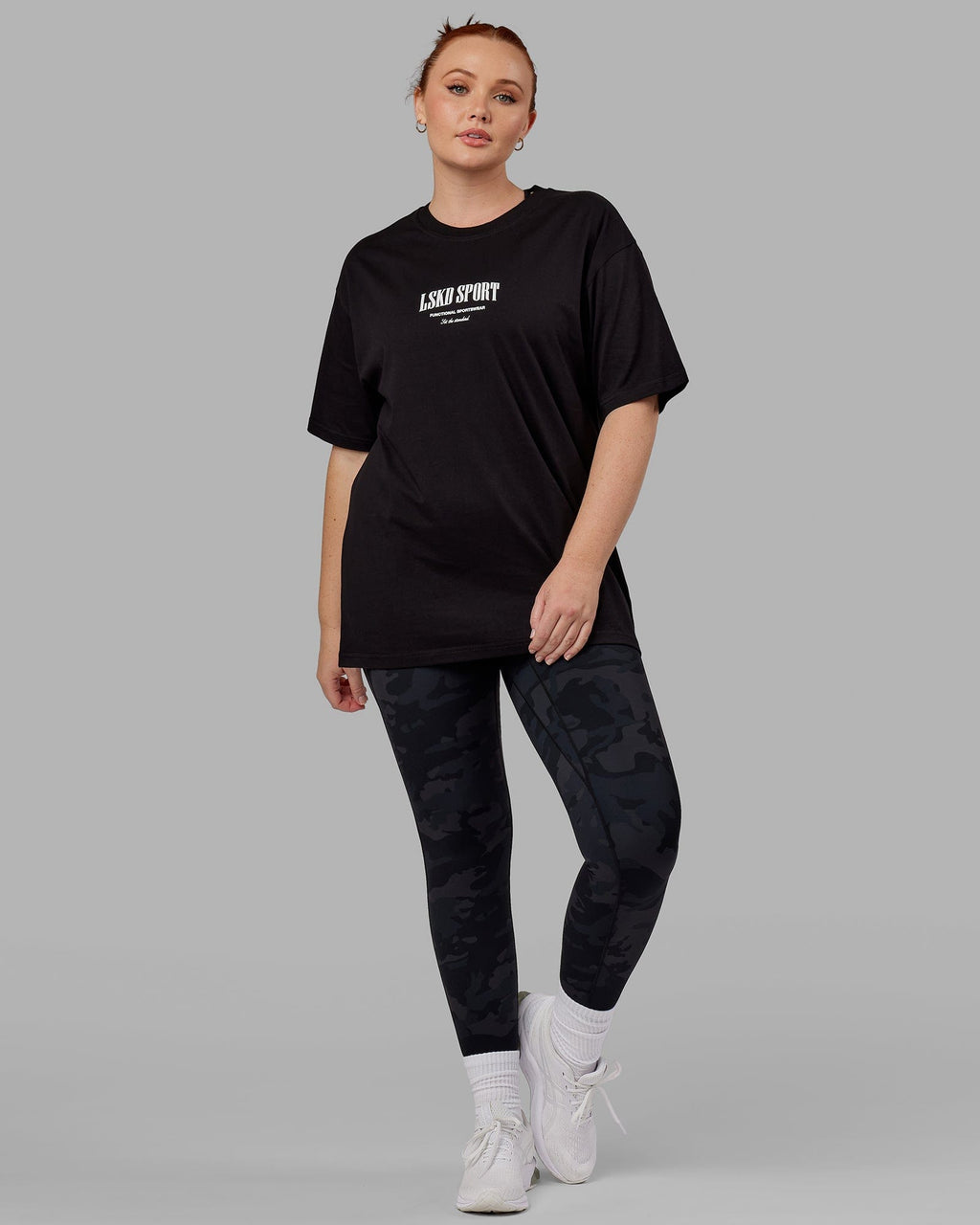Model wearing Unisex Standard Heavyweight Tee Oversize - Black-White