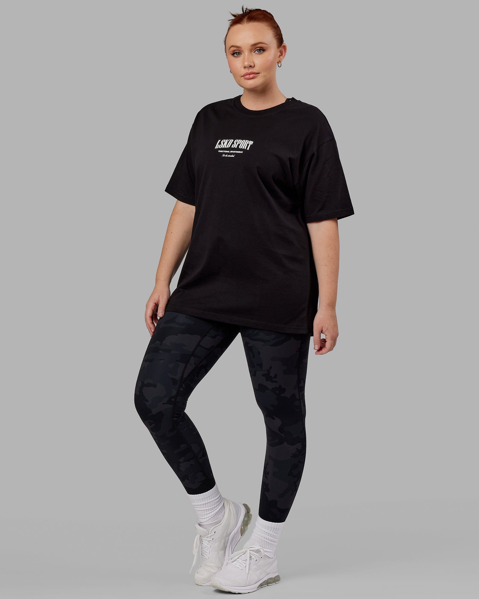 Model wearing Unisex Standard Heavyweight Tee Oversize - Black-White