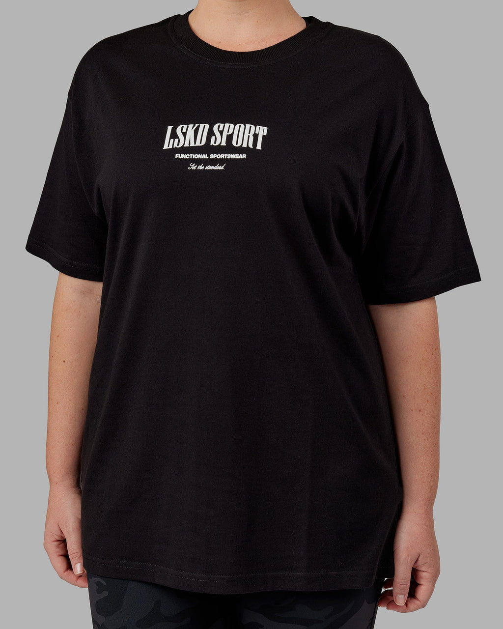 Model wearing Unisex Standard Heavyweight Tee Oversize - Black-White