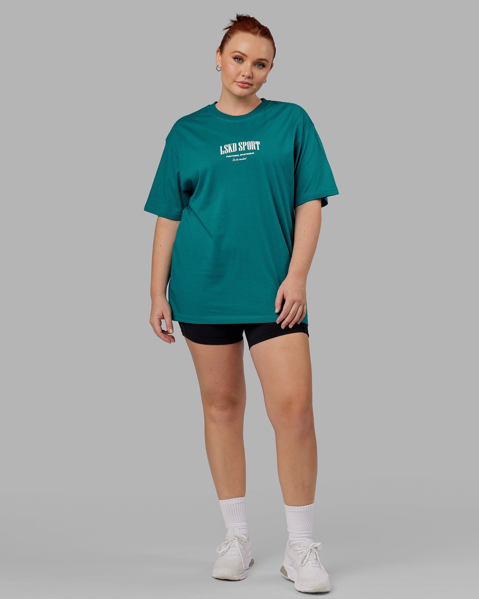 Model wearing Unisex Standard Heavyweight Tee Oversize - Deep Lake