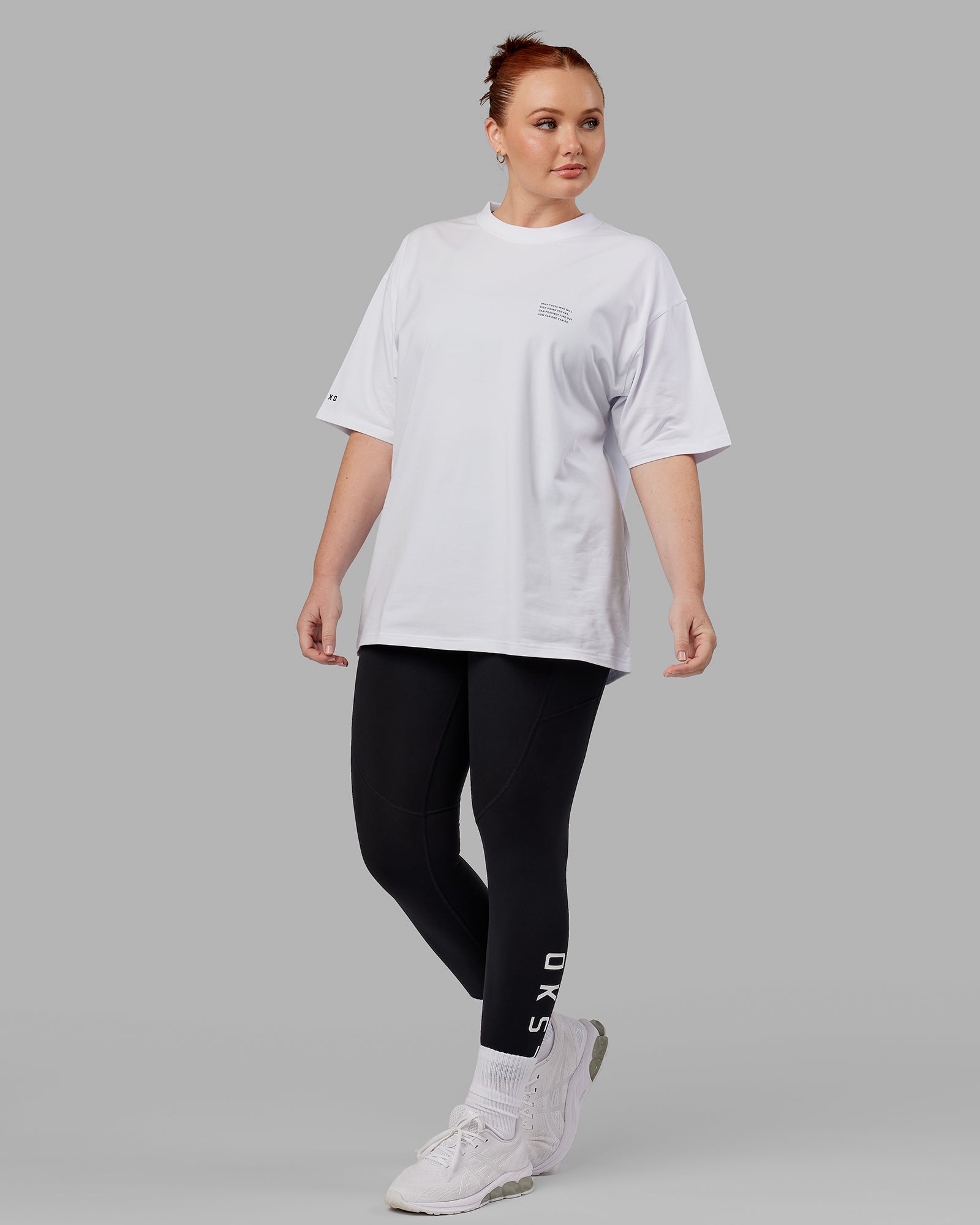 Model wearing Unisex Strive FLXCotton Tee Oversize - White