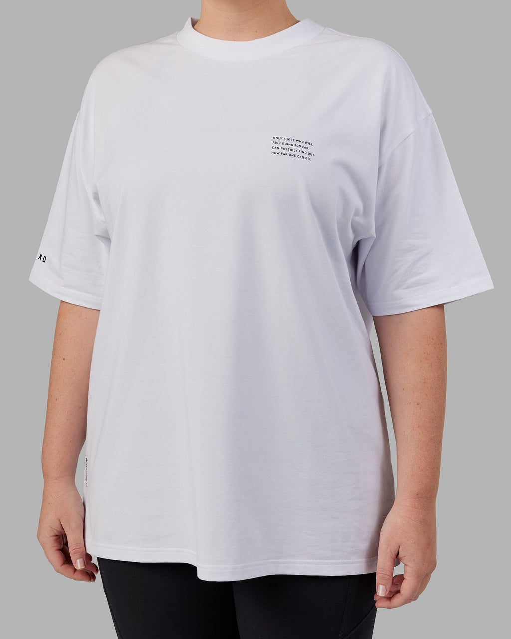 Model wearing Unisex Strive FLXCotton Tee Oversize - White