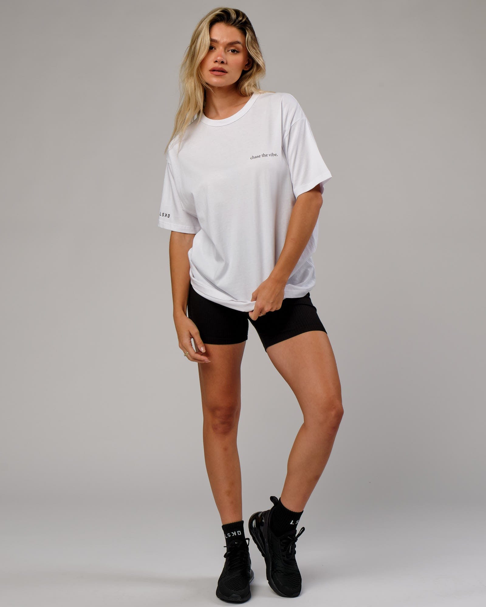 Model wearing Unisex Taylor Tee Oversize - White