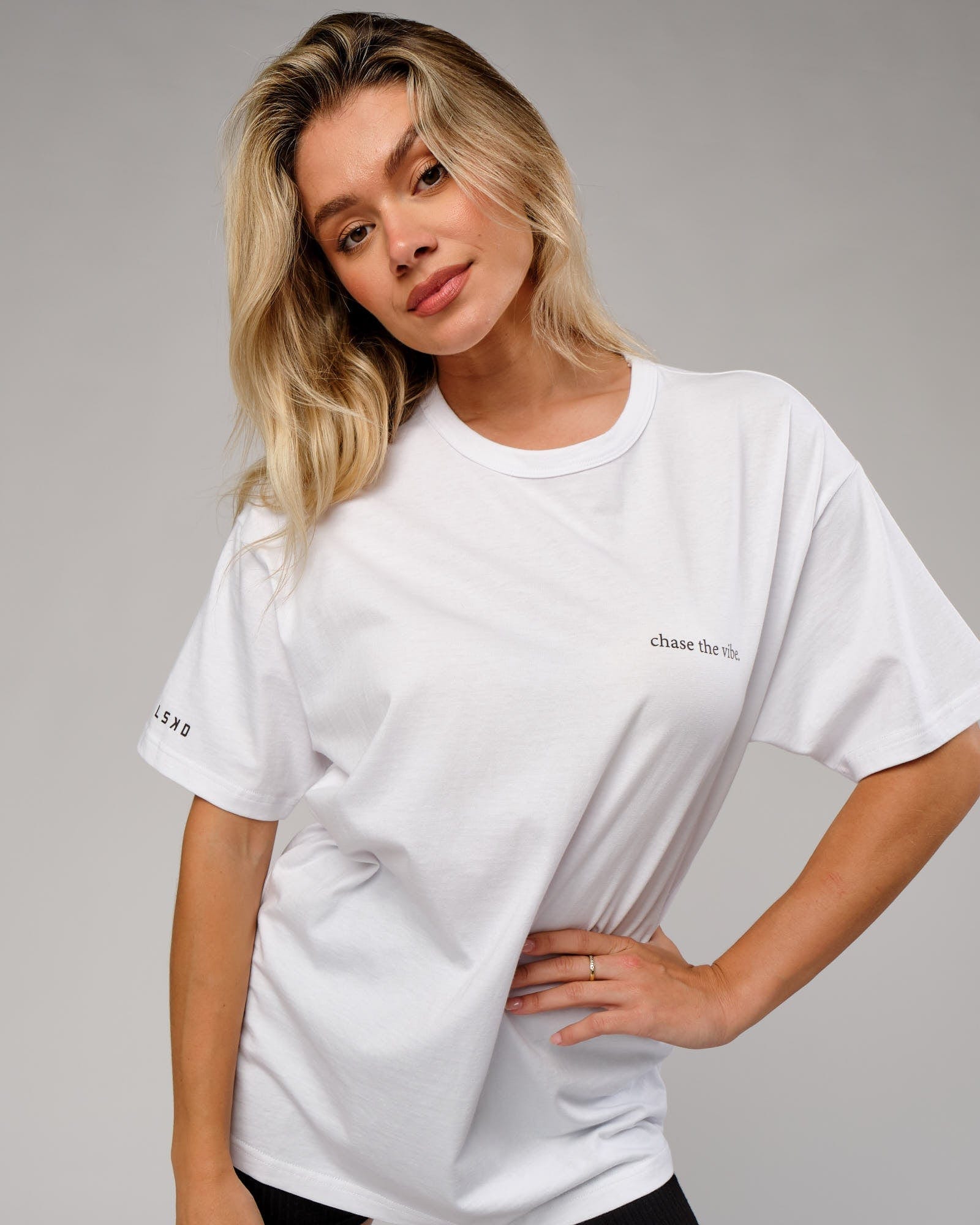 Model wearing Unisex Taylor Tee Oversize - White
