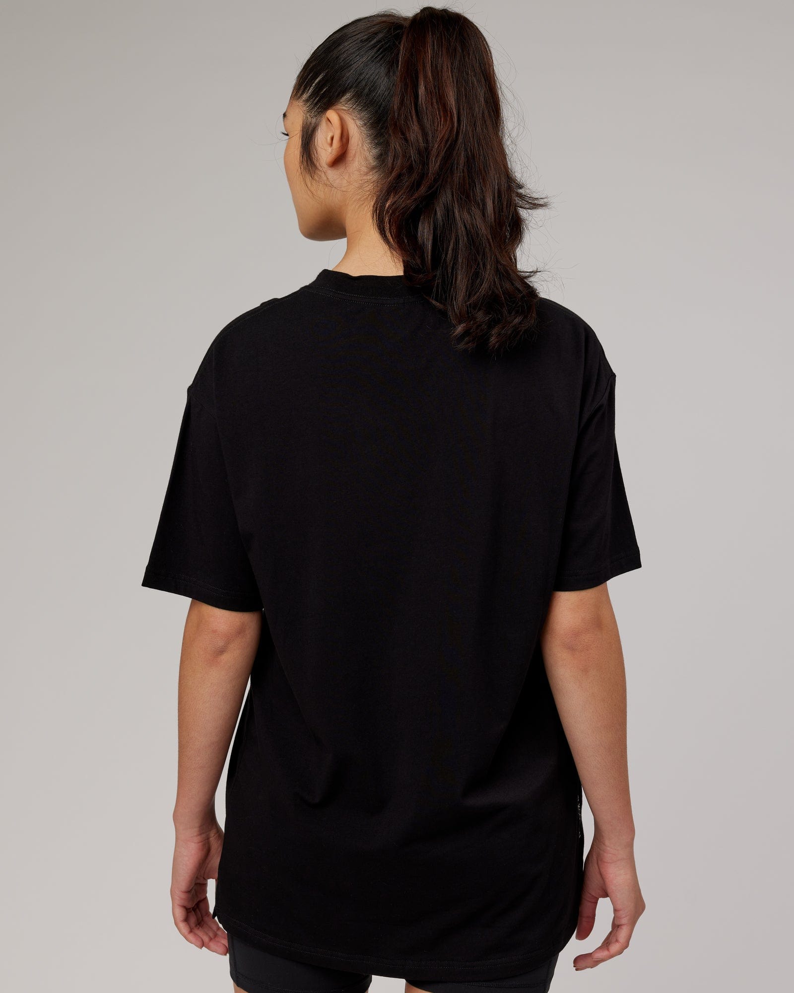 Model wearing Upright FLXCotton Tee Oversize - Black