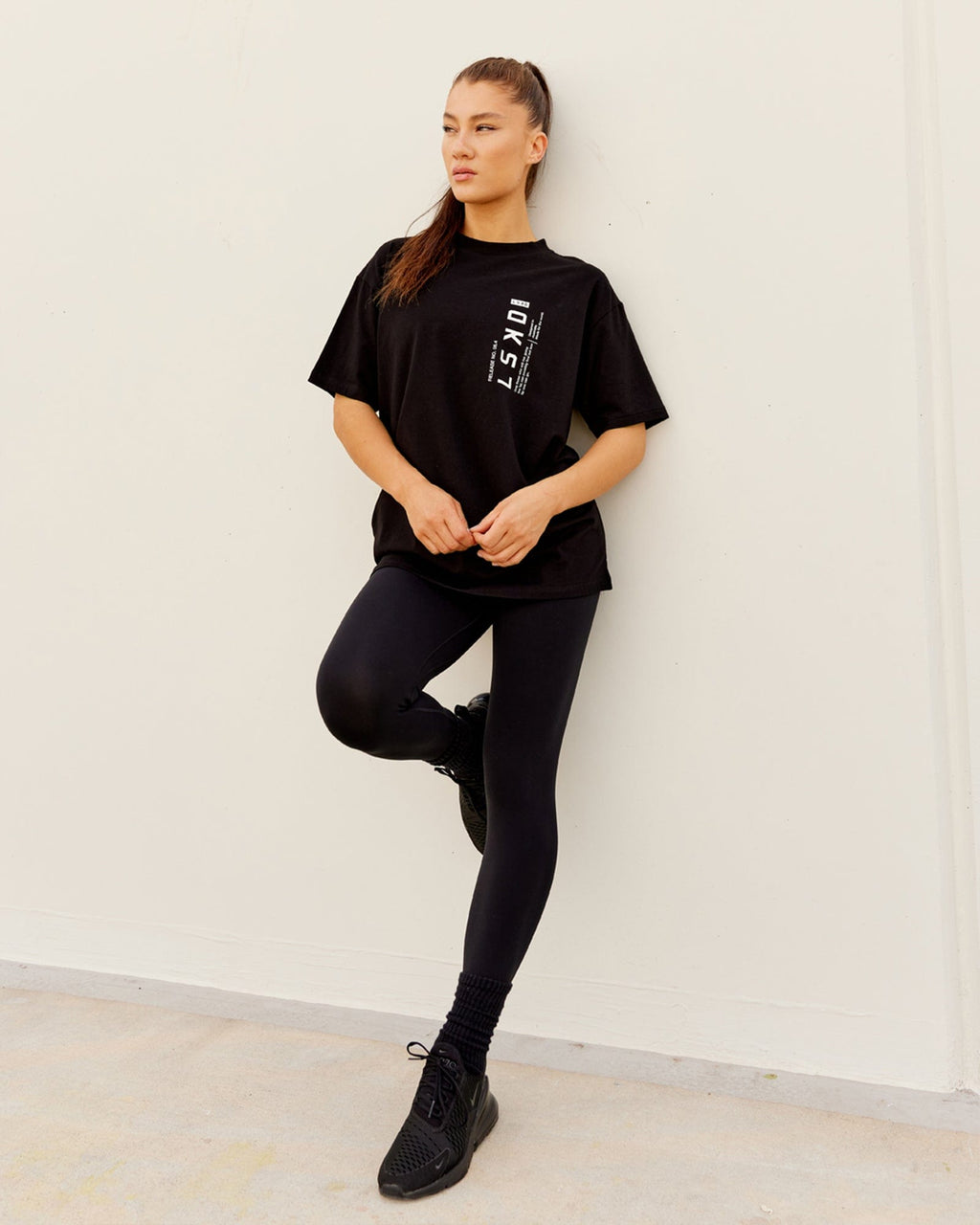 Model wearing Upright FLXCotton Tee Oversize - Black