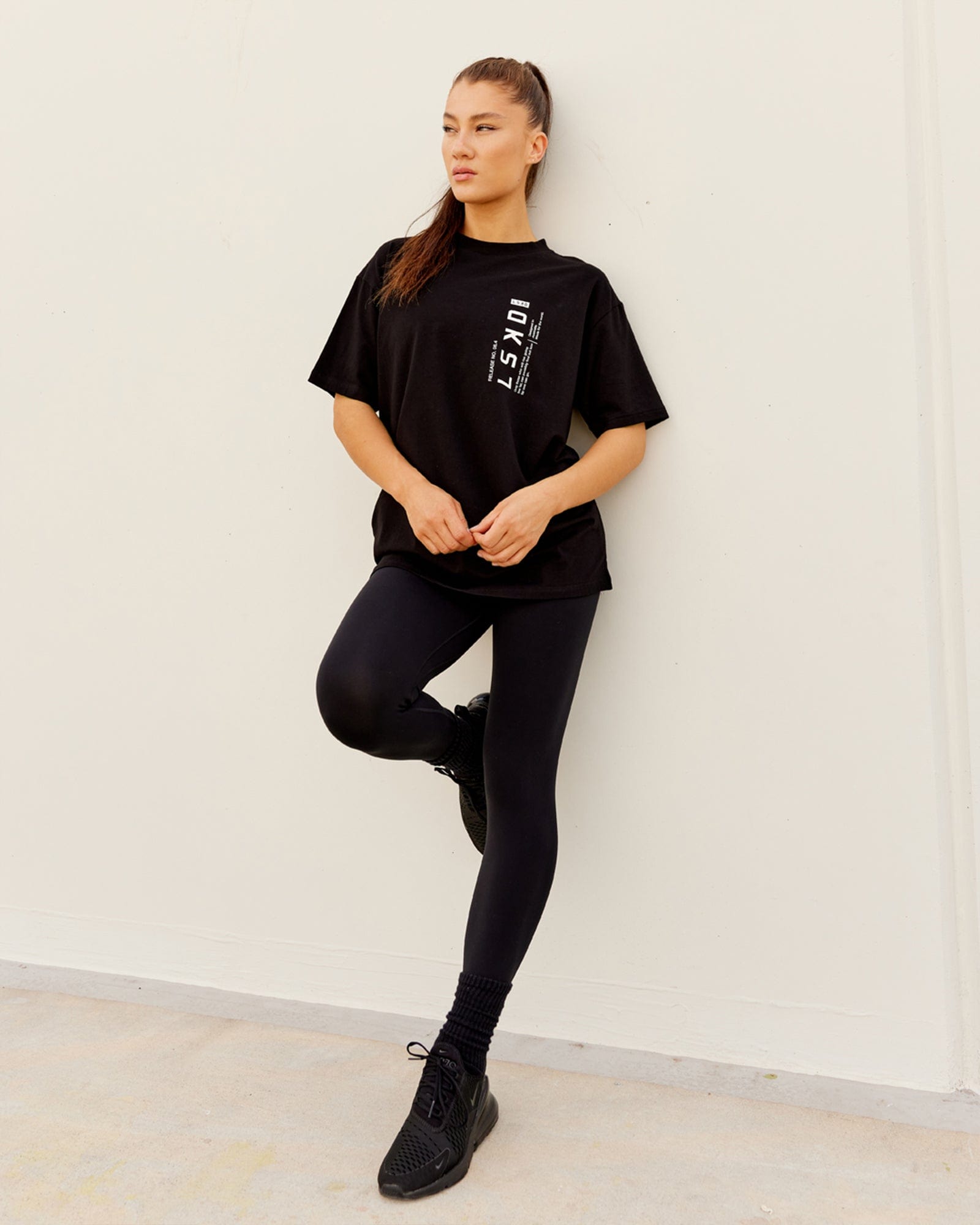 Model wearing Upright FLXCotton Tee Oversize - Black
