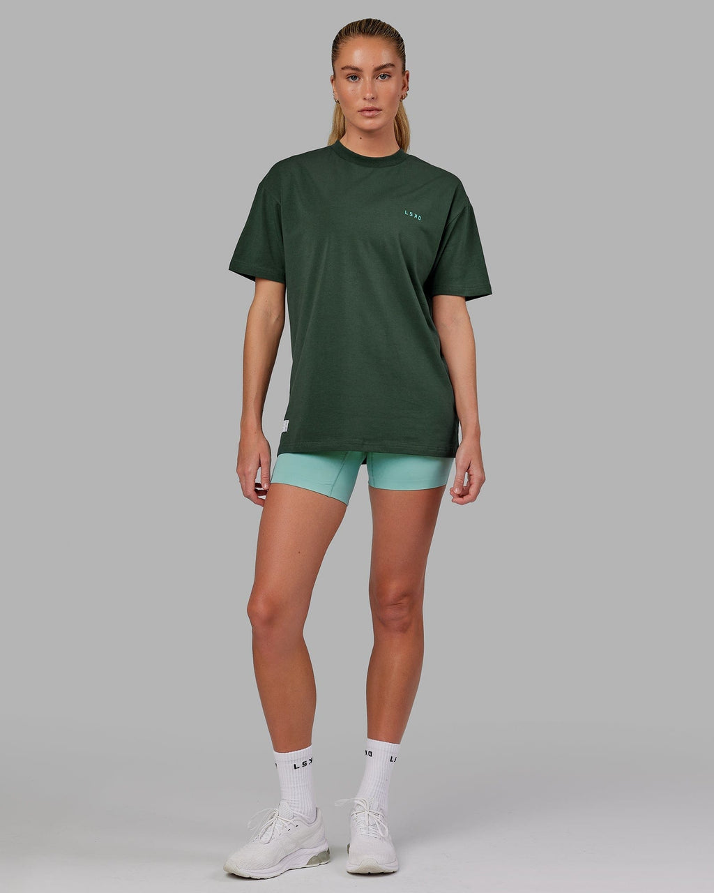 Model wearing Unisex VS2 FLXCotton Tee Oversize - Vital Green-Teal