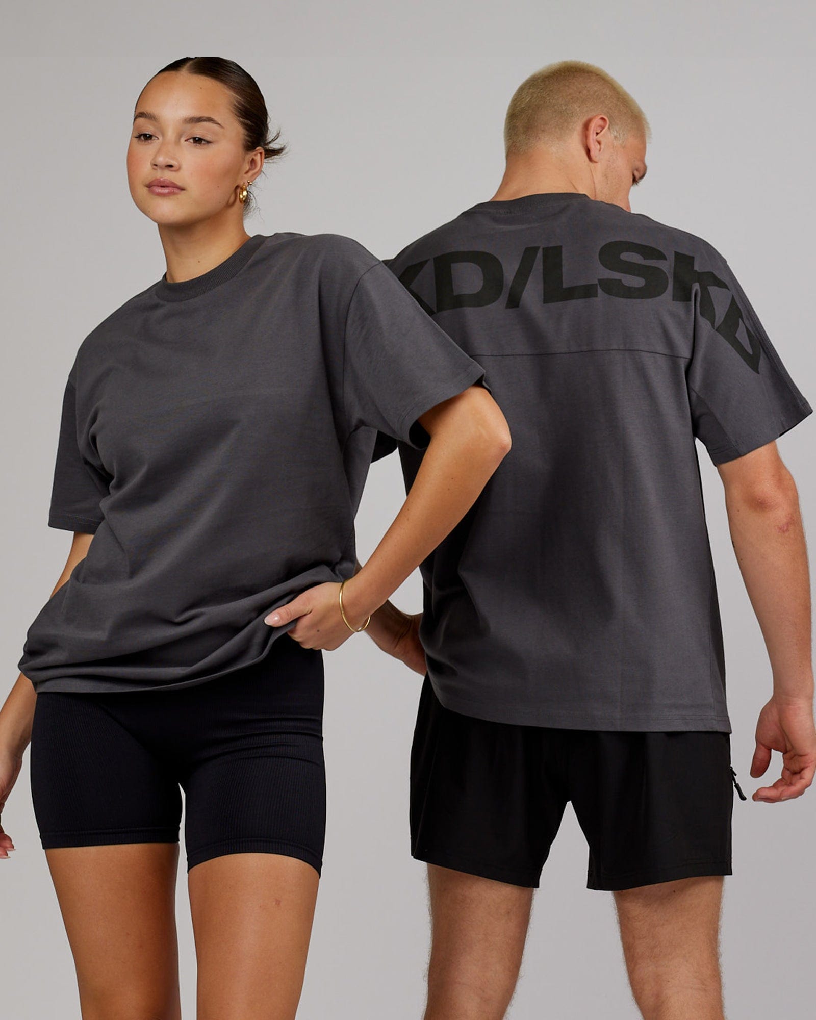 Model wearing Unisex Wrap Heavyweight Tee Oversize - Asphalt