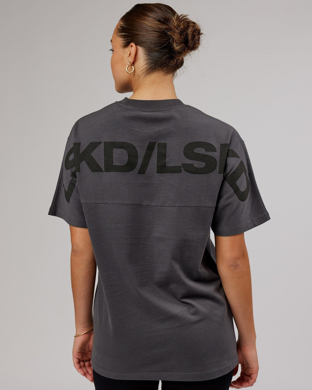 Model wearing Unisex Wrap Heavyweight Tee Oversize - Asphalt