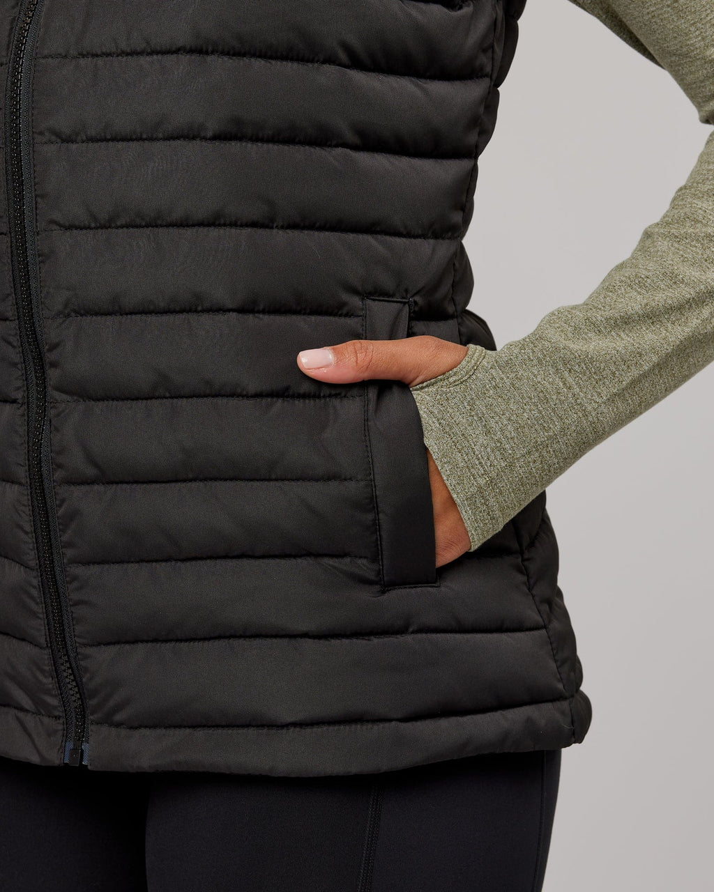 Model wearing Uplift Puffer Vest - Black Fade