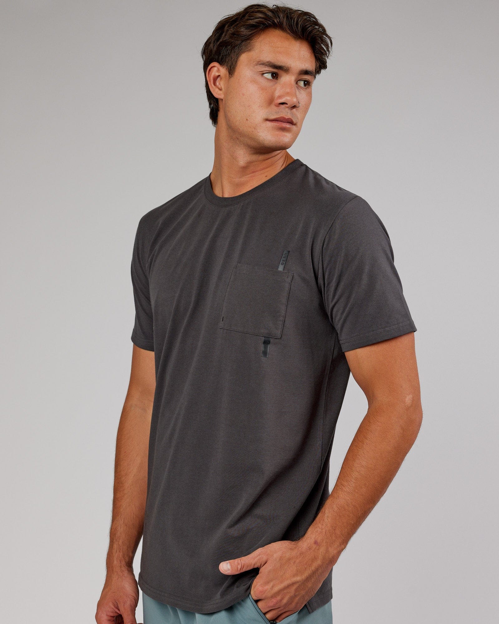 Model wearing Weld FLXCotton Pocket Tee - Asphalt